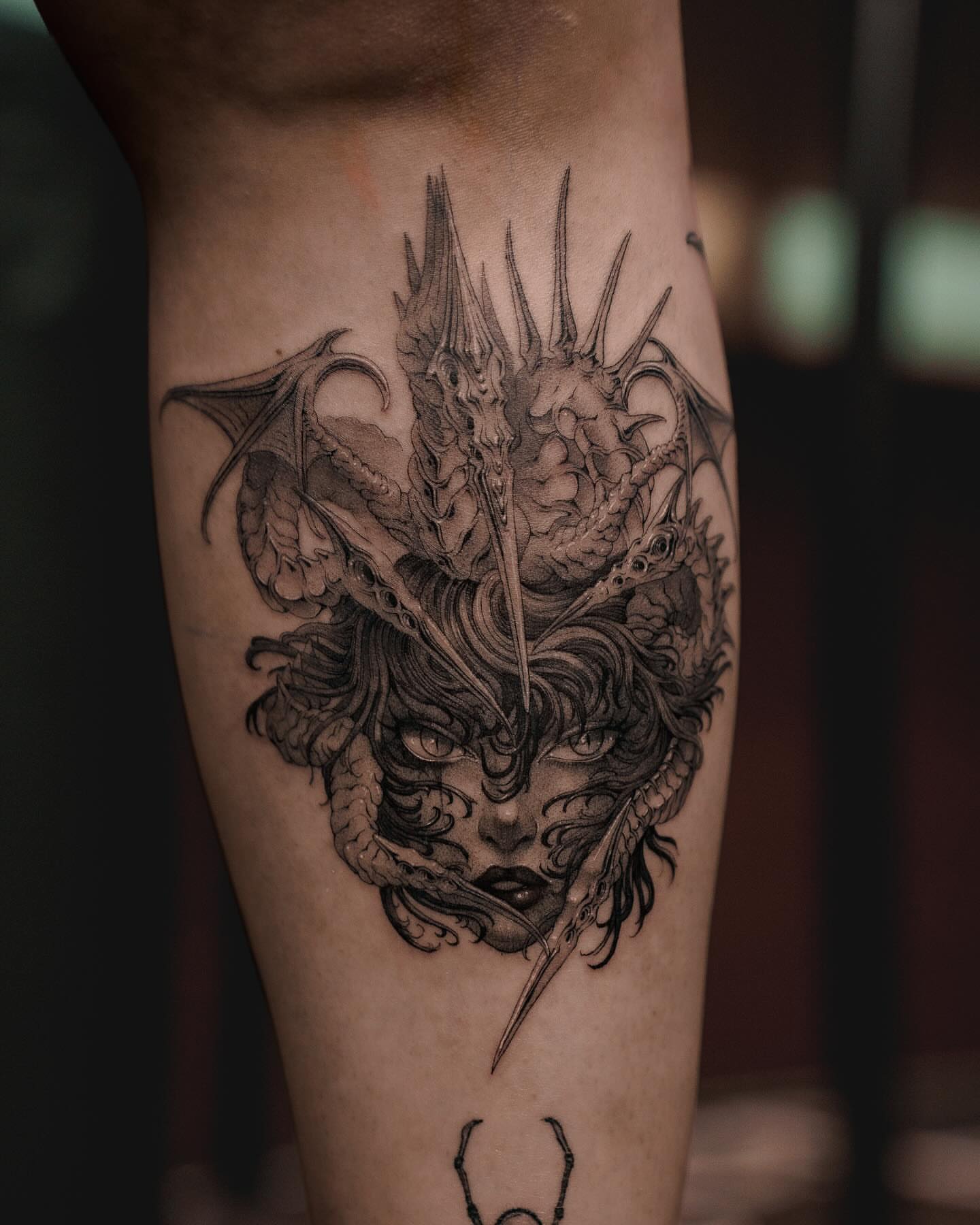 Tattoo by @nowthisyujhi — dark_realism, black_and_grey