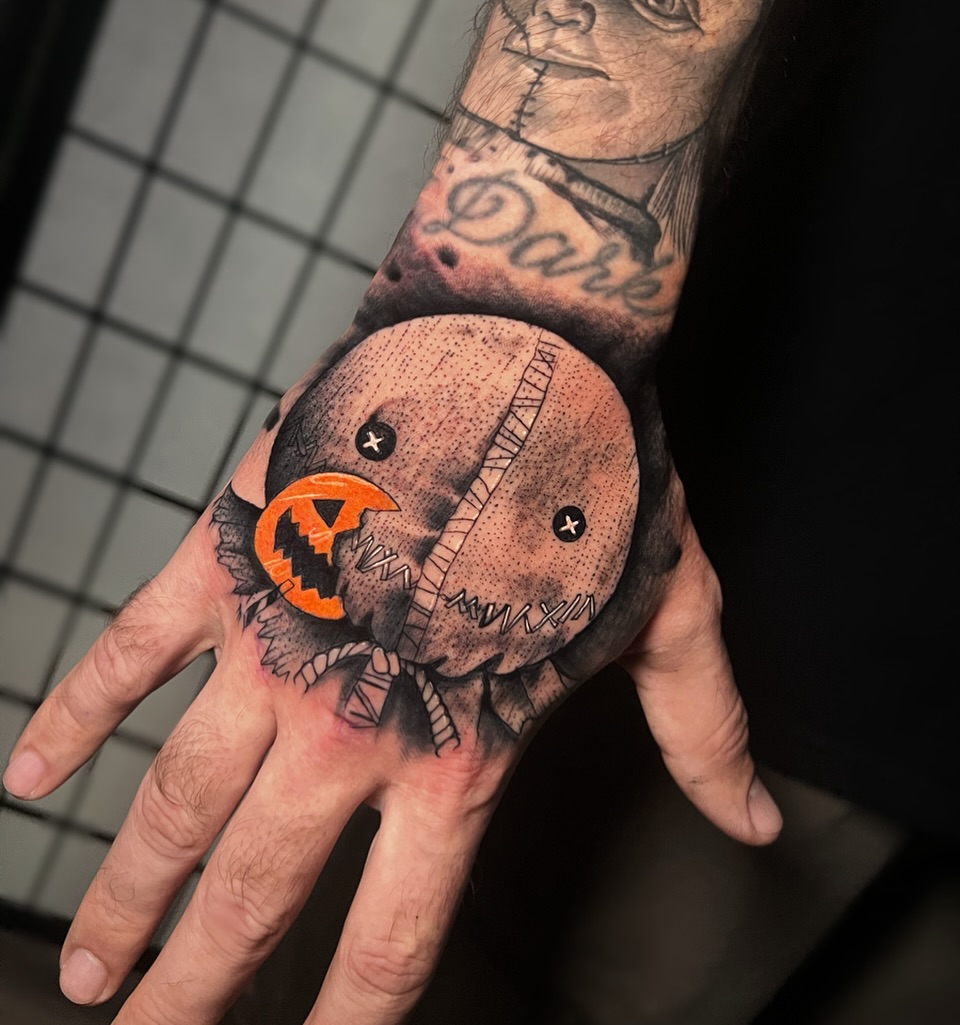 Pumpkin dotwork tattoo on the hand by Tattoo Artist