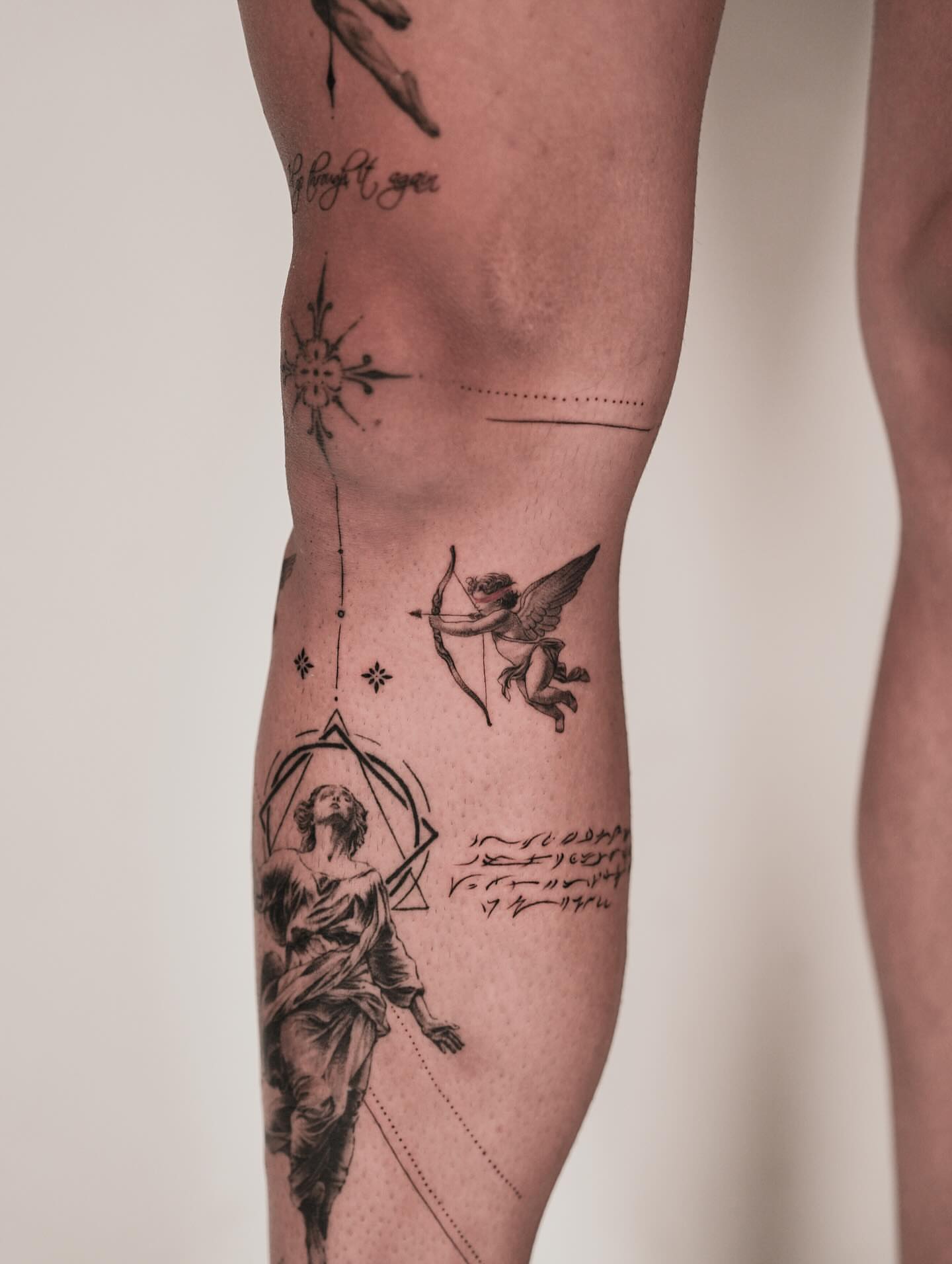Angel with wings realism tattoo on the calf by Jinzhi ye