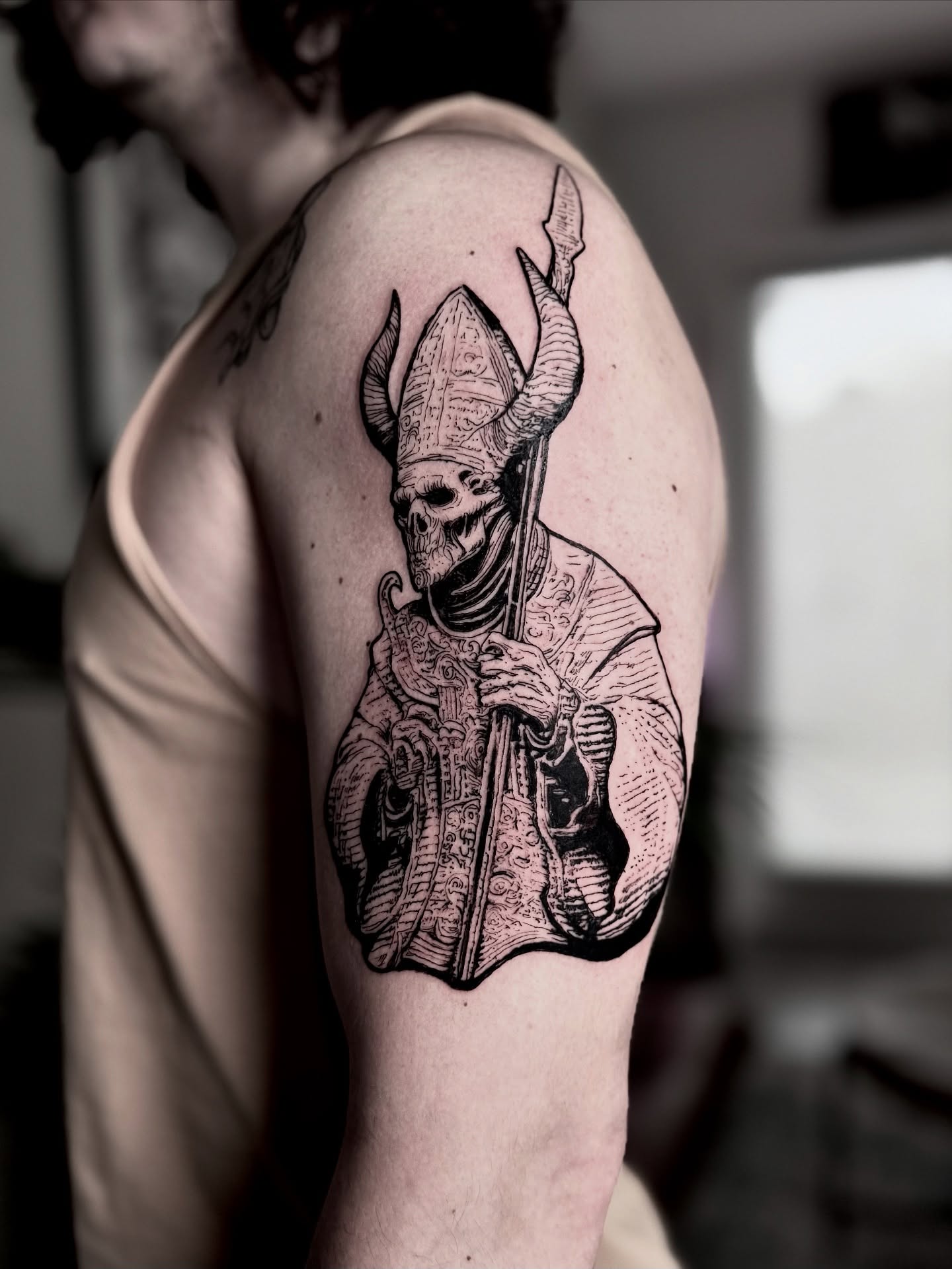 Skull in bishop's attire realism tattoo on the shoulder by Bwk Dark Art