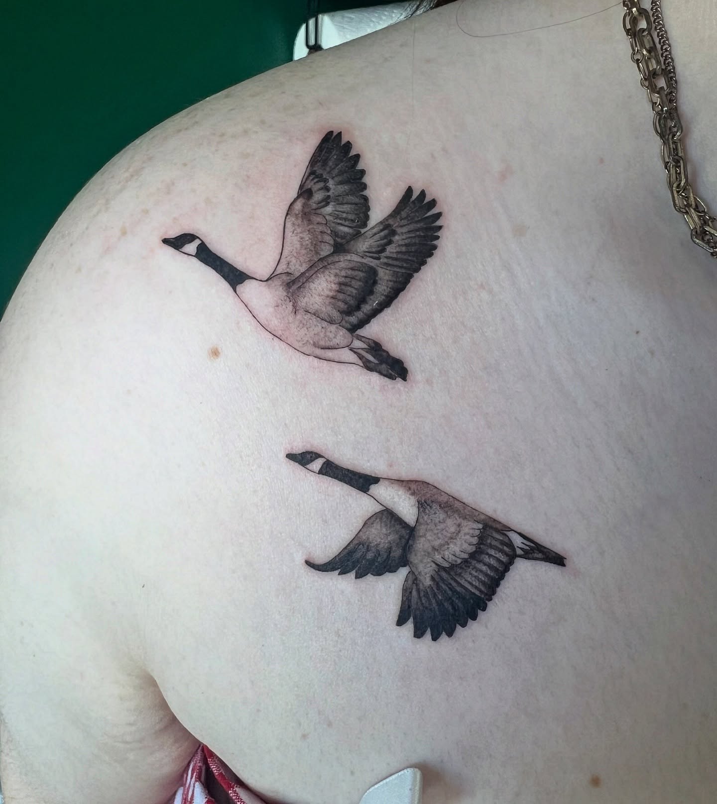 Geese in flight realism tattoo on the shoulder by Cortnie, Nashville, Tennessee