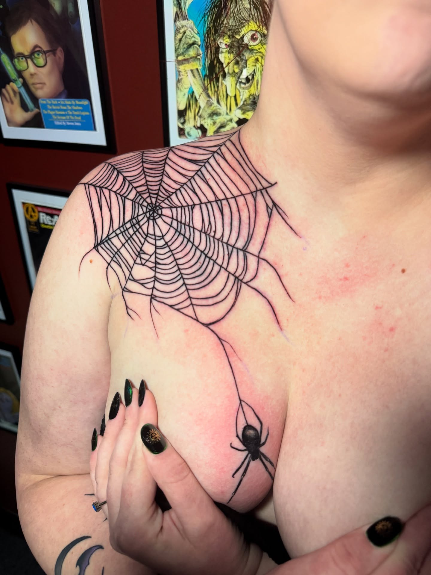 Spider web black and grey tattoo on the chest by Garrett Rautio