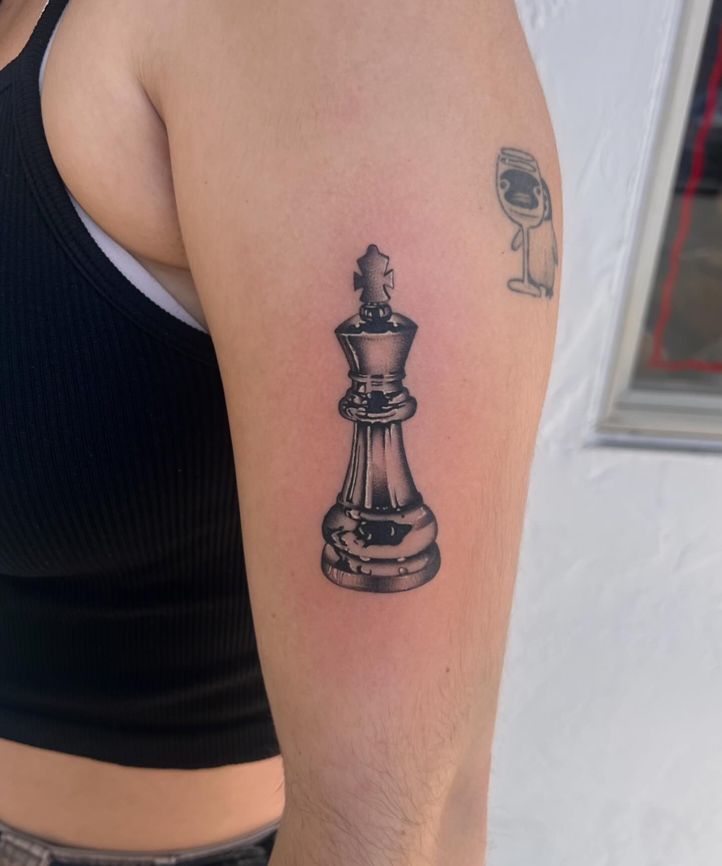 King chess piece black and grey tattoo on the forearm by ♛Mollie Evans
