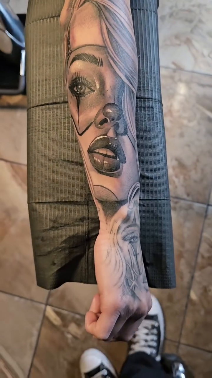 Woman with clown makeup realism tattoo by LMT Custom Ink - Leo Montanes Tattoos