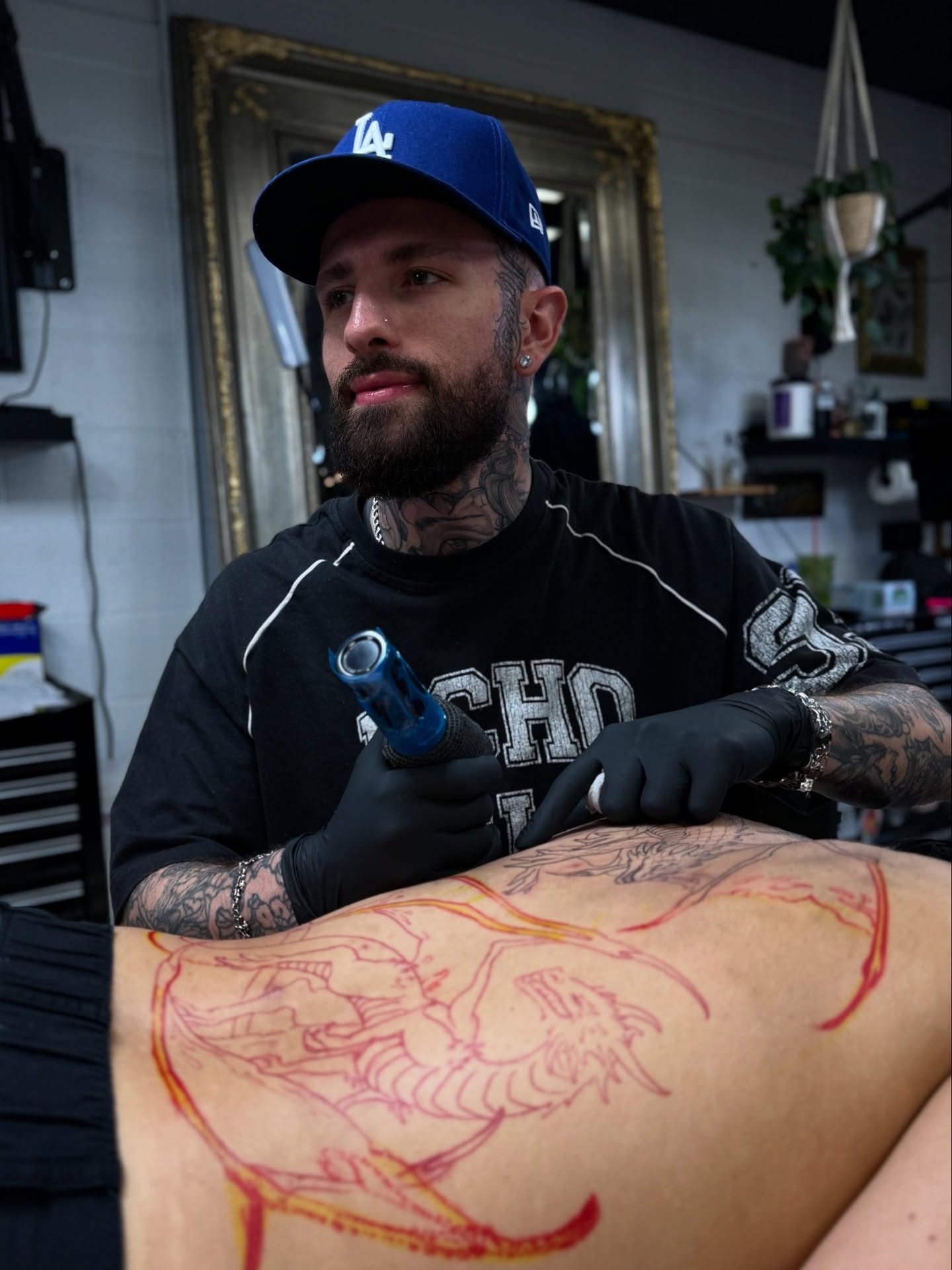 Dragon American traditional tattoo on the thigh by Angelo Buonanno, Las Vegas, Nevada
