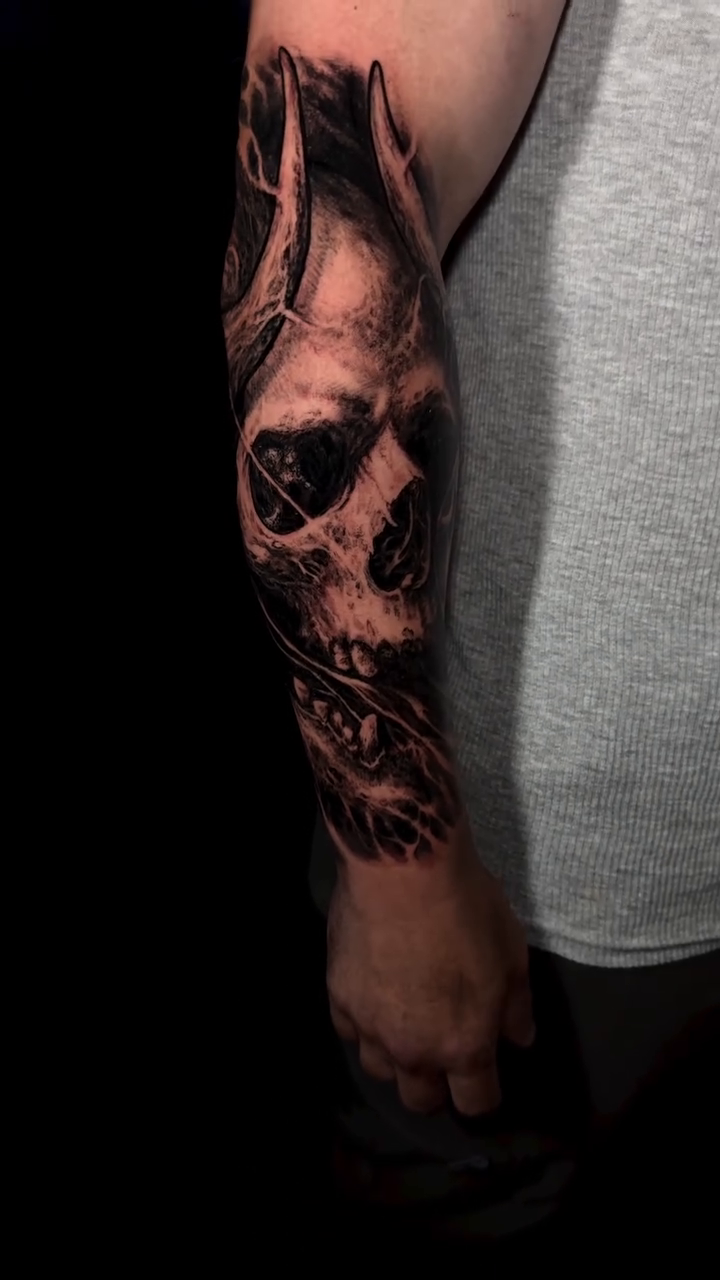 Skull with mechanical elements realism tattoo by Cory James