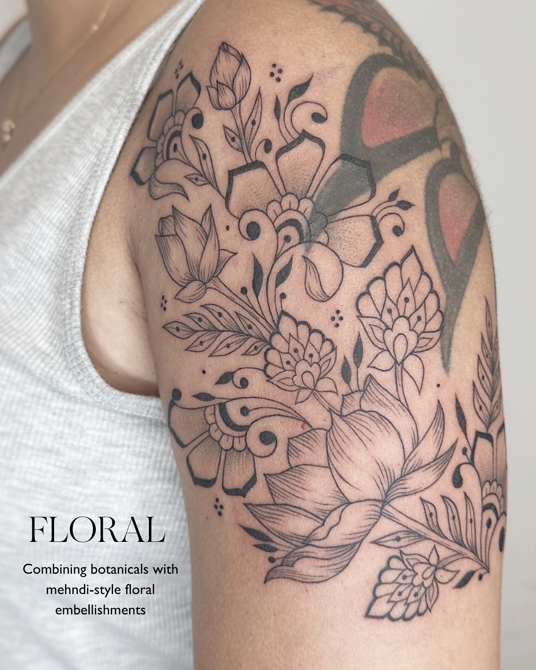 Floral black and grey tattoo on the shoulder by Sabreena Haque