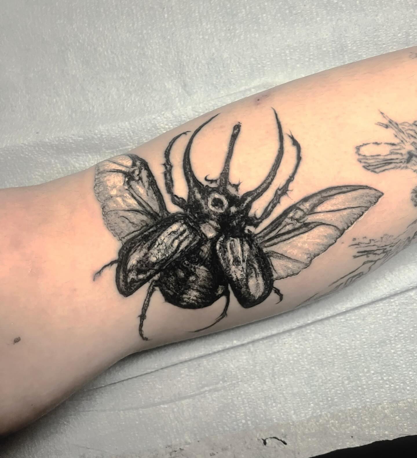 Tattoo by @dan_henk_tattoo — black_and_grey