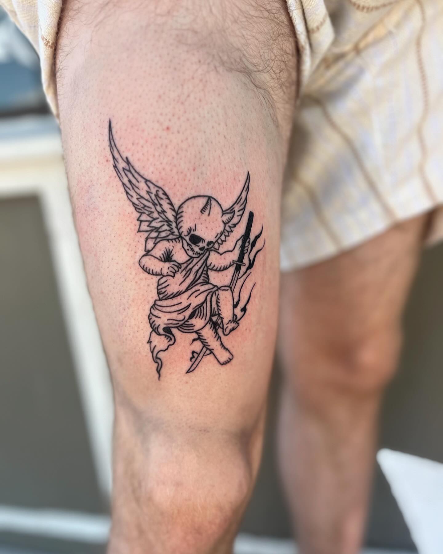 Angelic figure black and grey tattoo on the forearm by Jai Woods