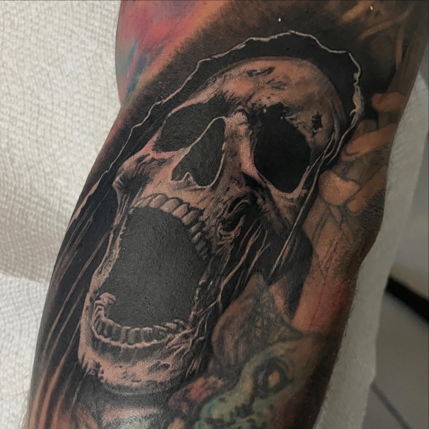 Skull dark realism tattoo on the forearm by payaso