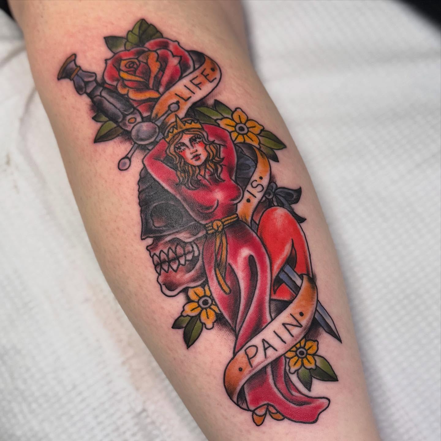 Skull and woman American traditional tattoo on the forearm by Tattoos By Trish