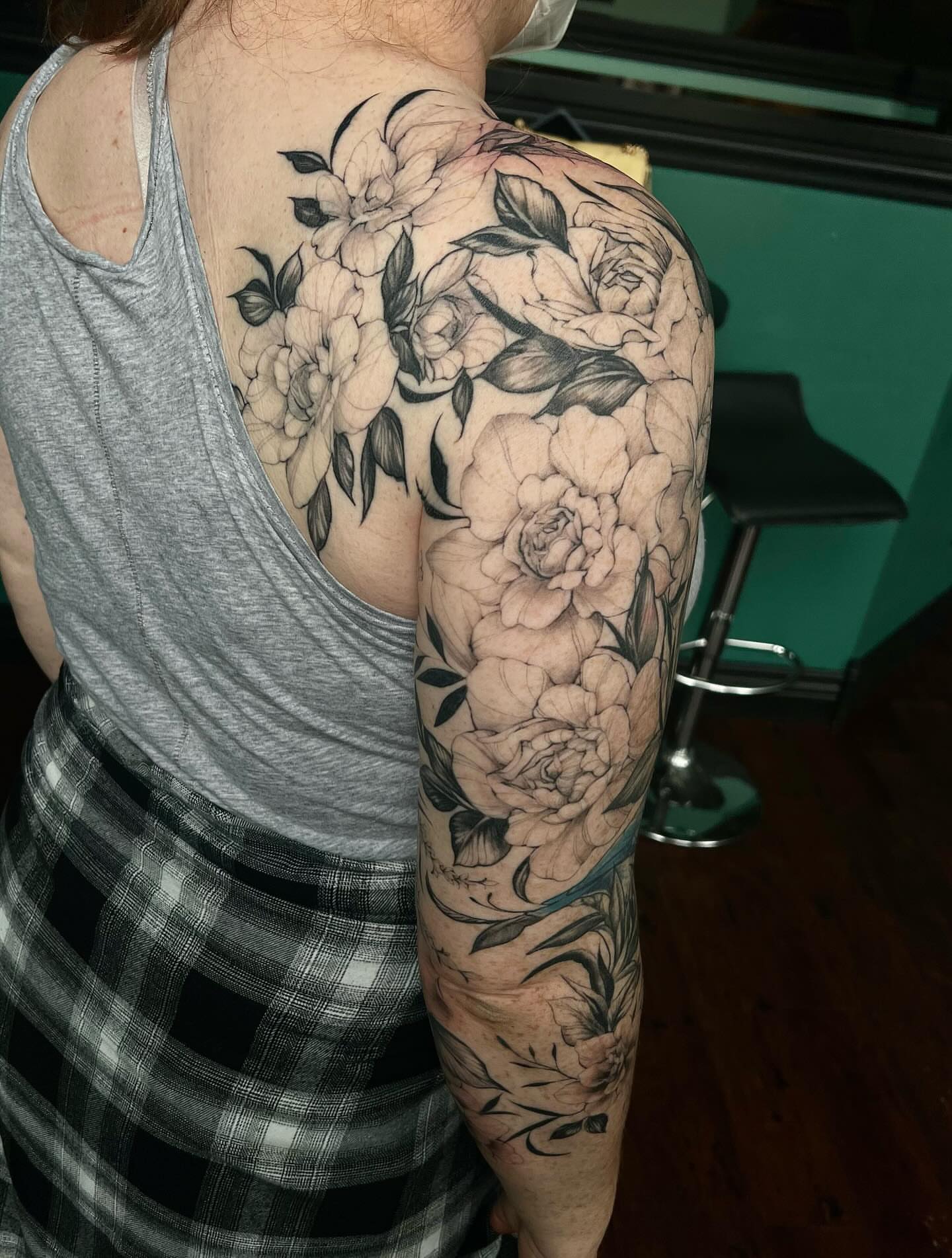 Peony flowers black and grey tattoo on the upper arm by ༒ boniandi༒