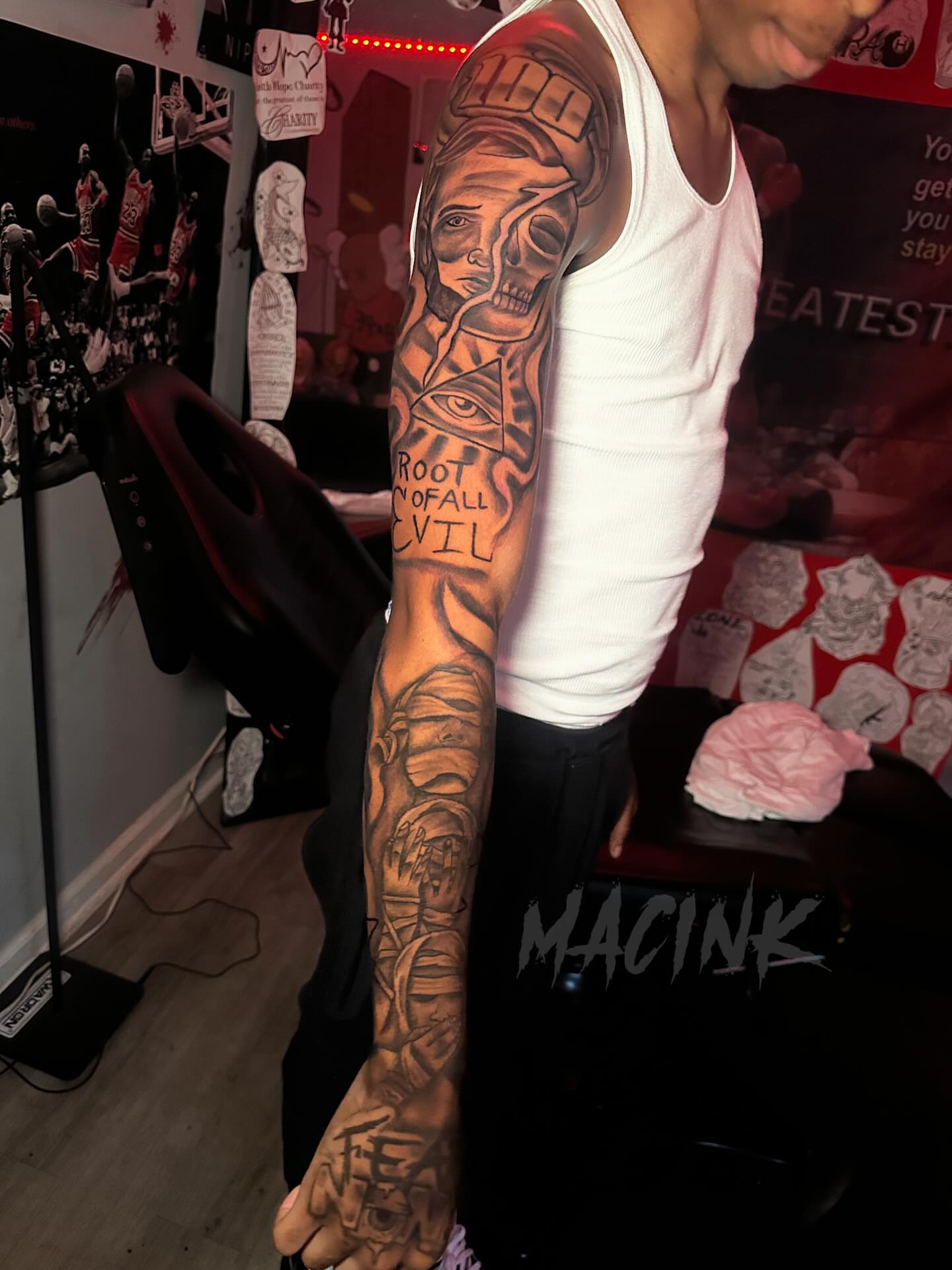 Skull and eye realism tattoo on the upper arm by ATL Tattoo Artist💲