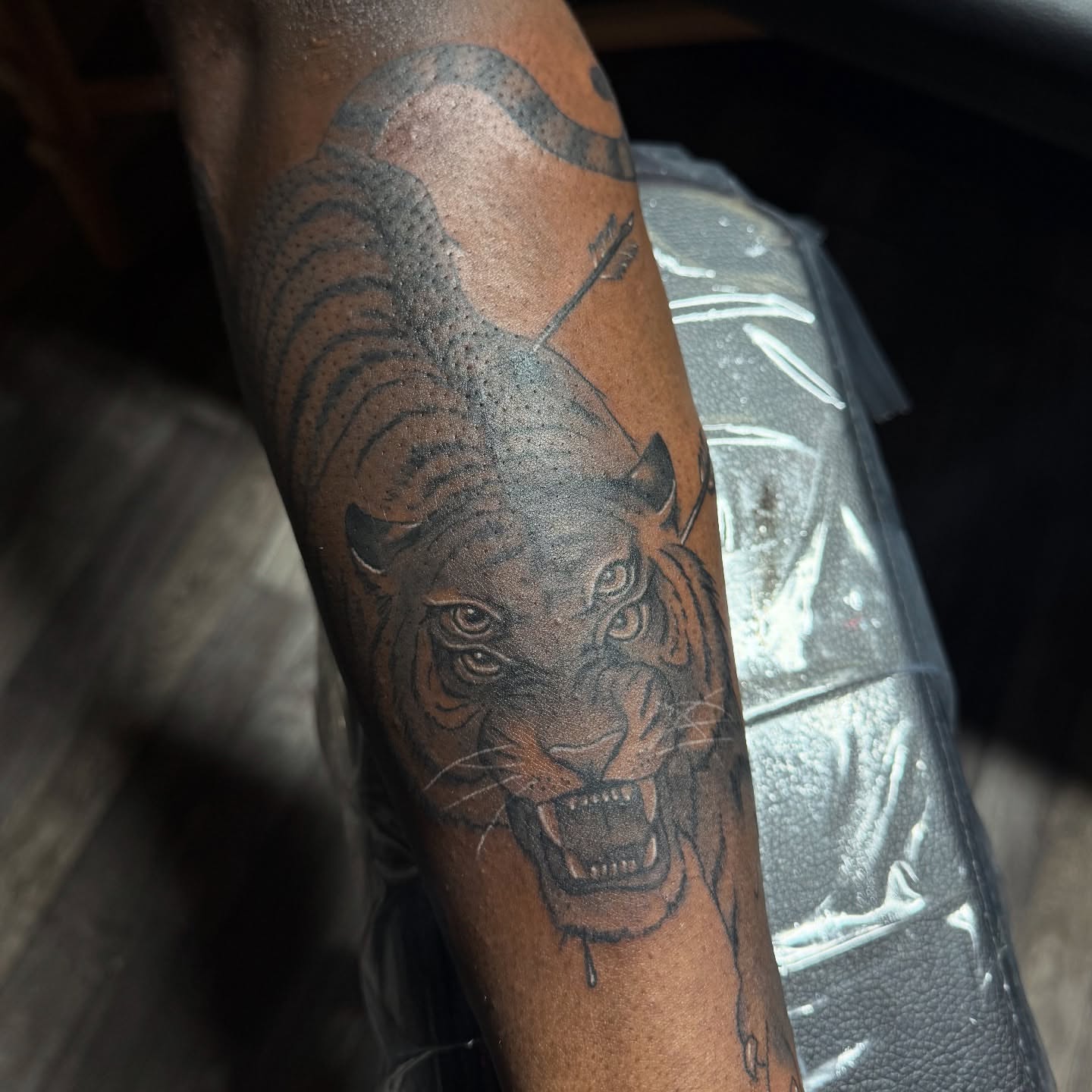 Tiger dotwork tattoo on the forearm by Tattoosxjoseph