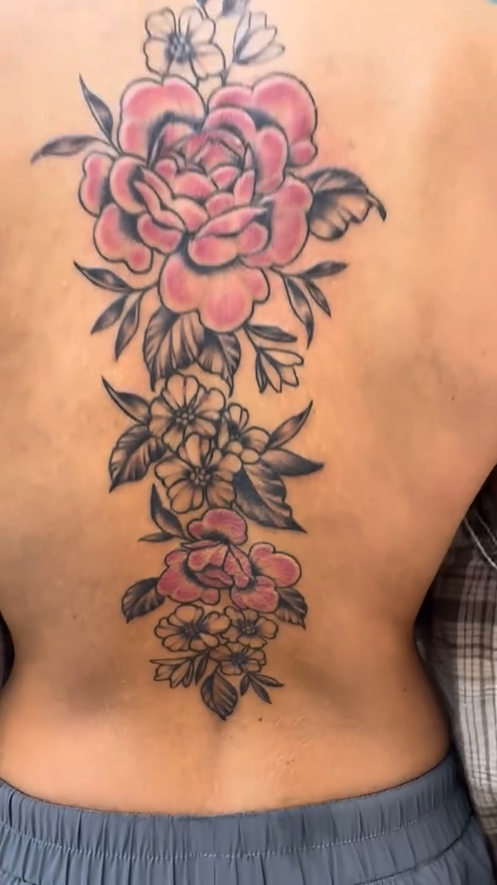 Floral arrangement neo-traditional tattoo by Heather Cherish