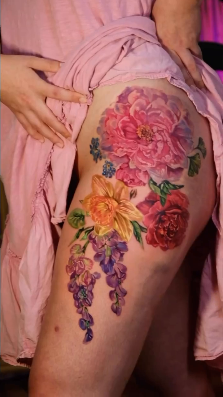 Floral arrangement realism tattoo by Colorful Tattoos by Cody Dean