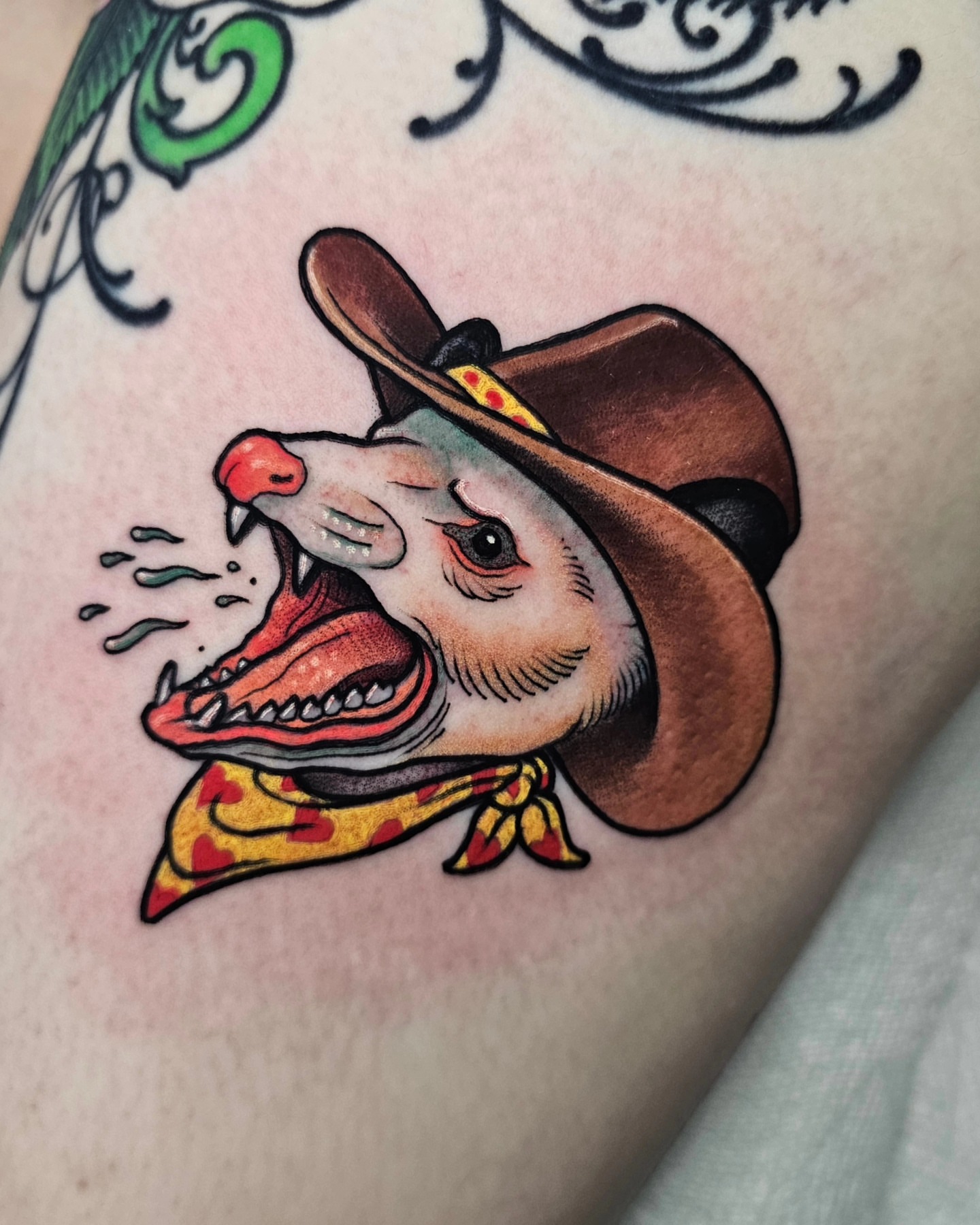 Cowboy dog American traditional tattoo on the upper arm by Shannon