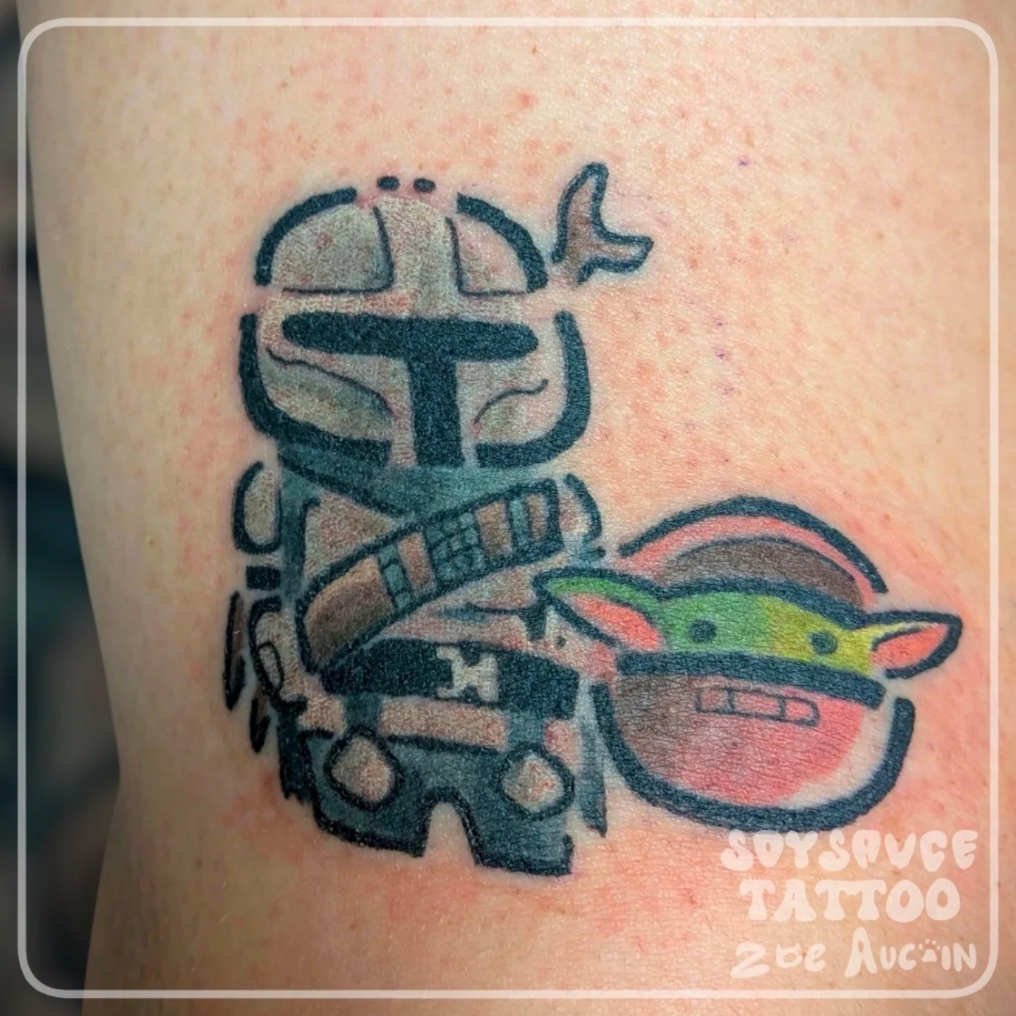 Mandalorian and child dotwork tattoo on the thigh by Zoe Aucoin