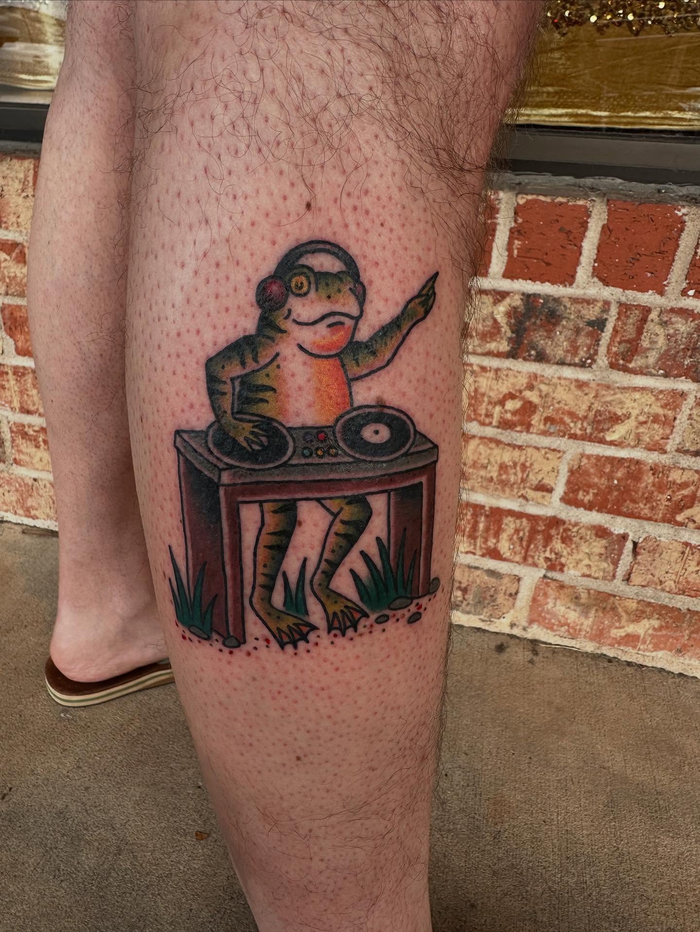 Frog DJ American traditional tattoo on the thigh by Whitney Creep Tattoos