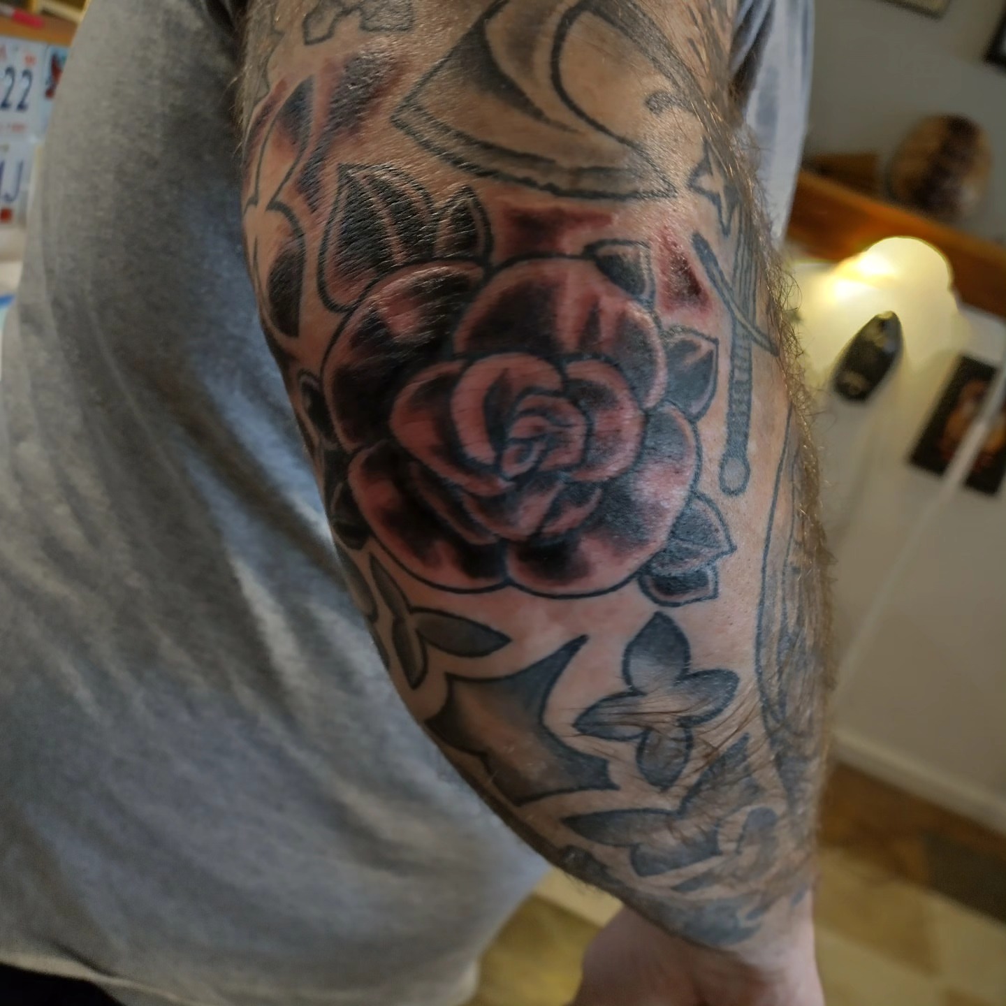 Rose American traditional tattoo on the forearm by Matt Williamson