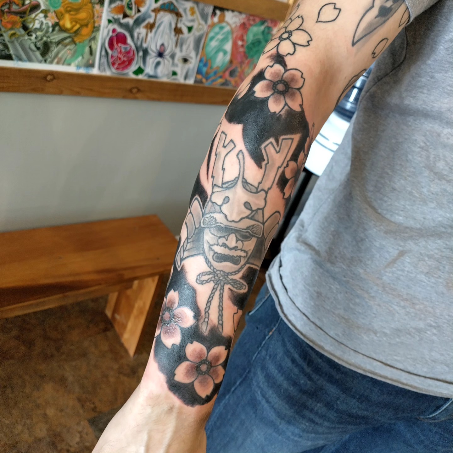 Cherry blossoms and kanji black and grey tattoo on the forearm by Matt Williamson