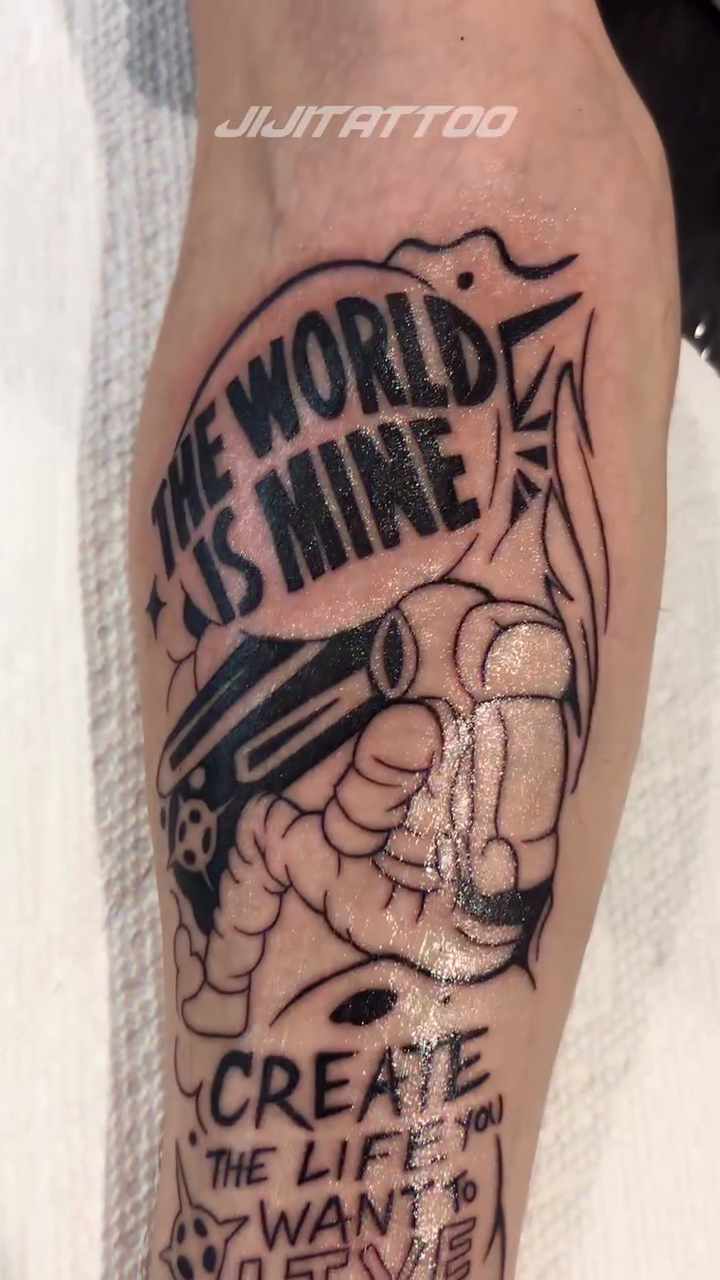 Astronaut holding a gun with text lettering script tattoo by 🇰🇷jijitattoo 🇺🇸