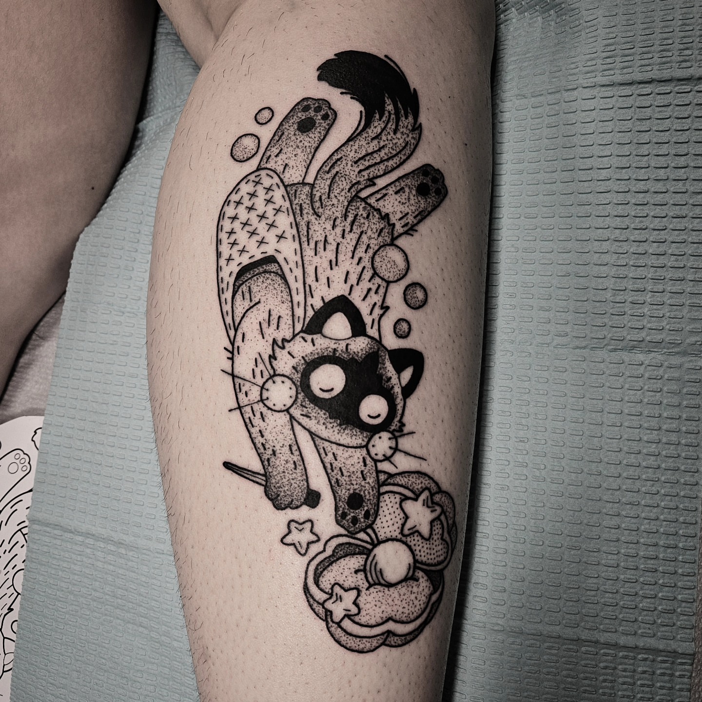 Cat dotwork tattoo on the thigh by Kirk George