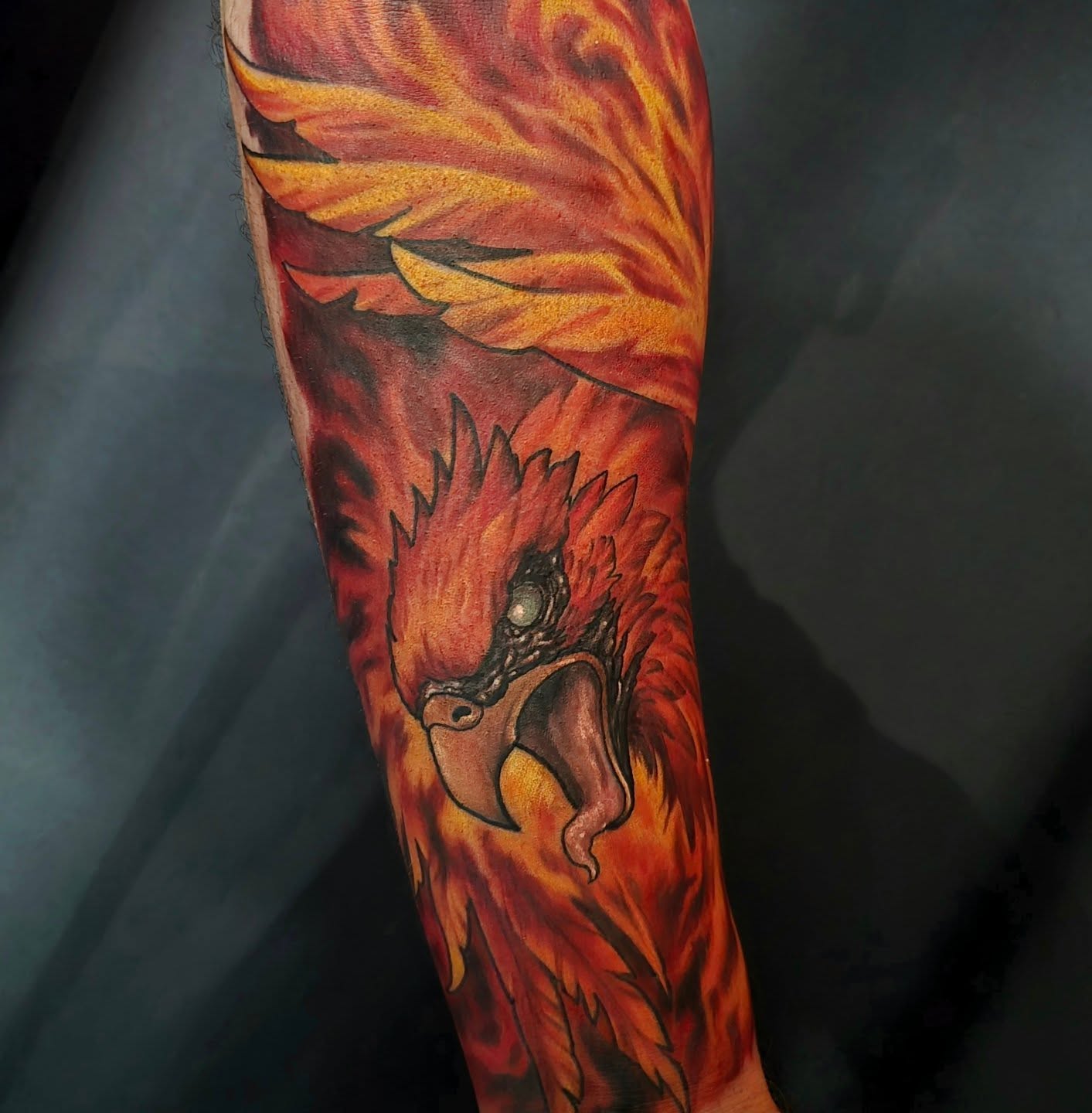 Phoenix realism tattoo on the forearm by Gabrielle Nicole Soucie