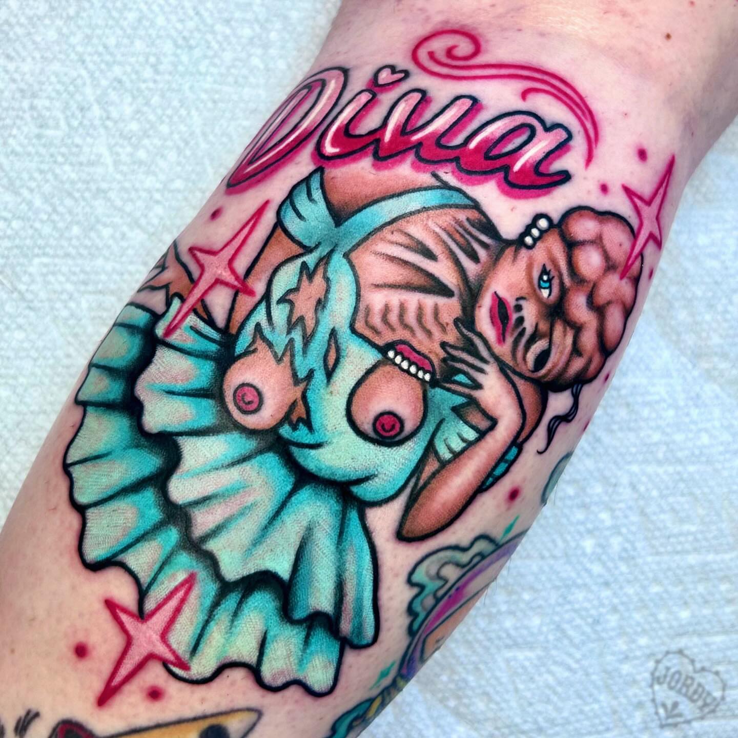 Mermaid and lion American traditional tattoo on the forearm by jordy, Philadelphia, Pennsylvania