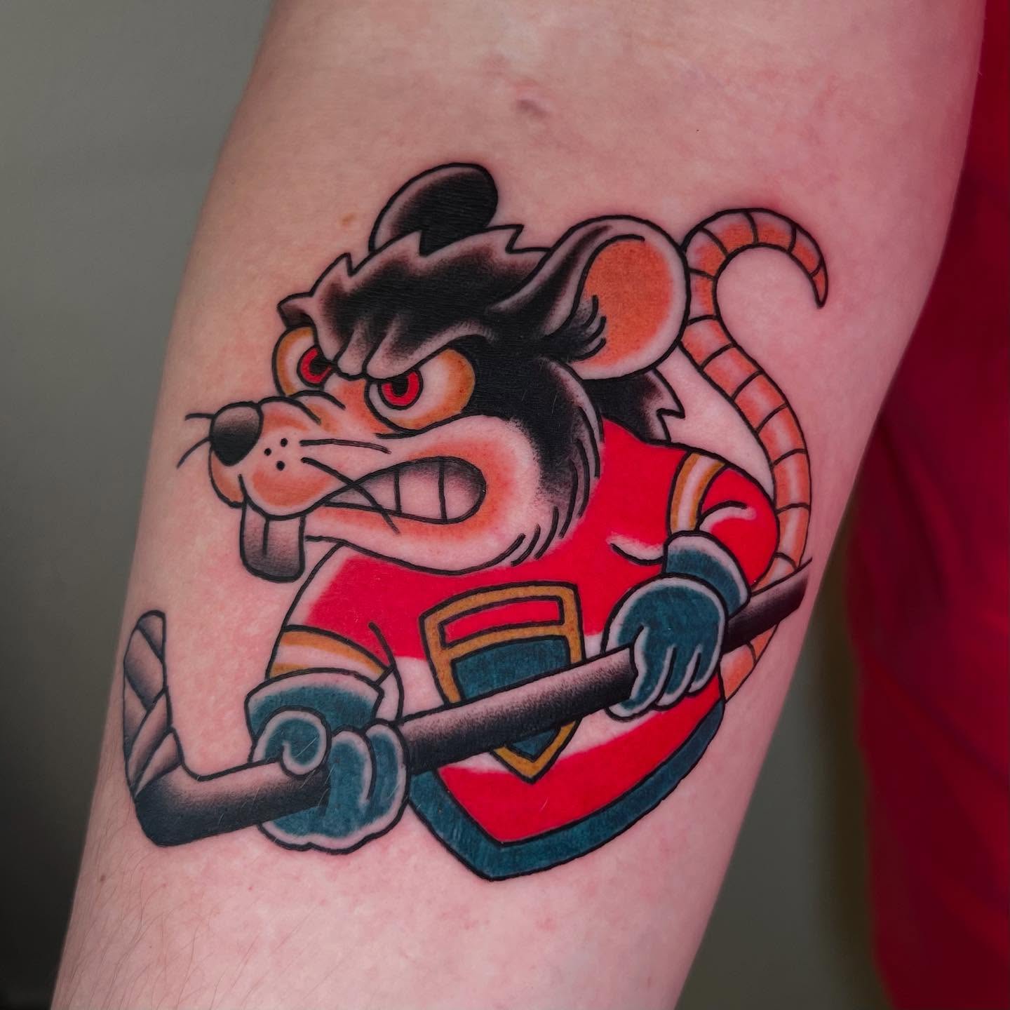 Mouse character American traditional tattoo on the forearm by Brandon Mizrahi