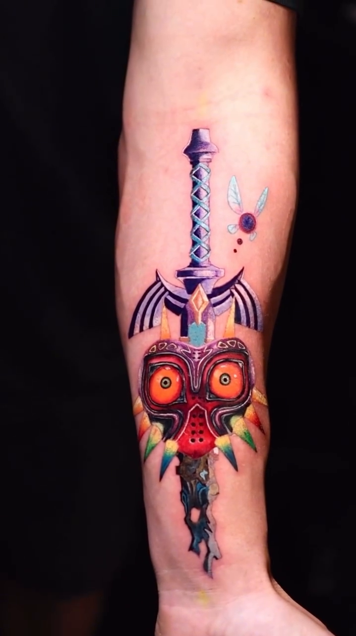 Majora's Mask and Fierce Deity Sword realism tattoo by Binn Binn - Houston Tattoo Artist