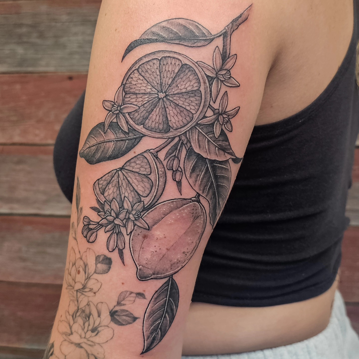 Tattoo by @plaidbear_designco — black_and_grey, realism