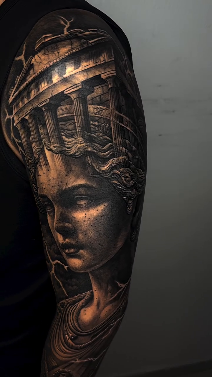 Tattoo by @elmertattoo1 — realism, black_and_grey