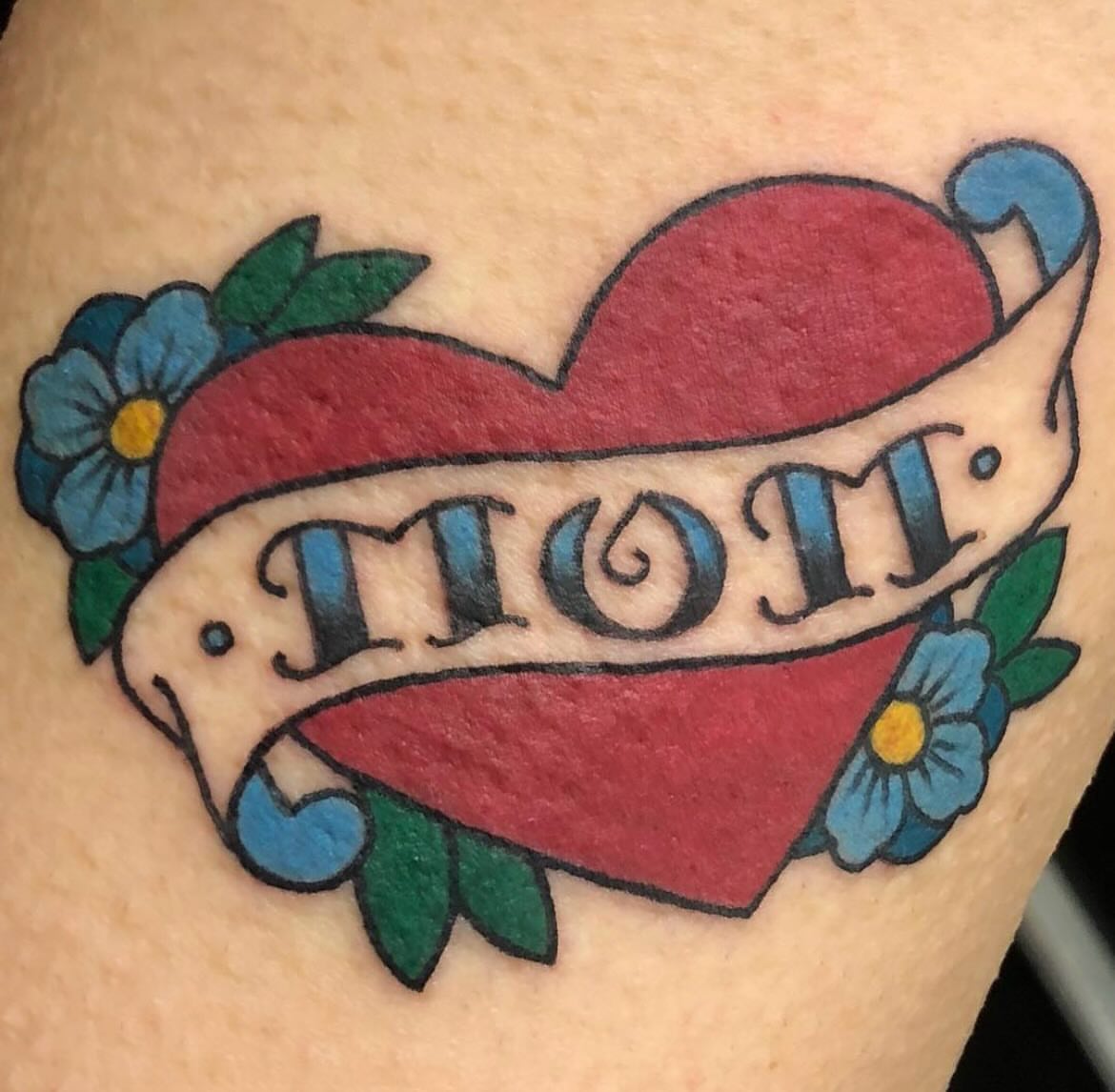Heart with banner American traditional tattoo on the thigh by Shayna Soderstrom, Columbus, Ohio