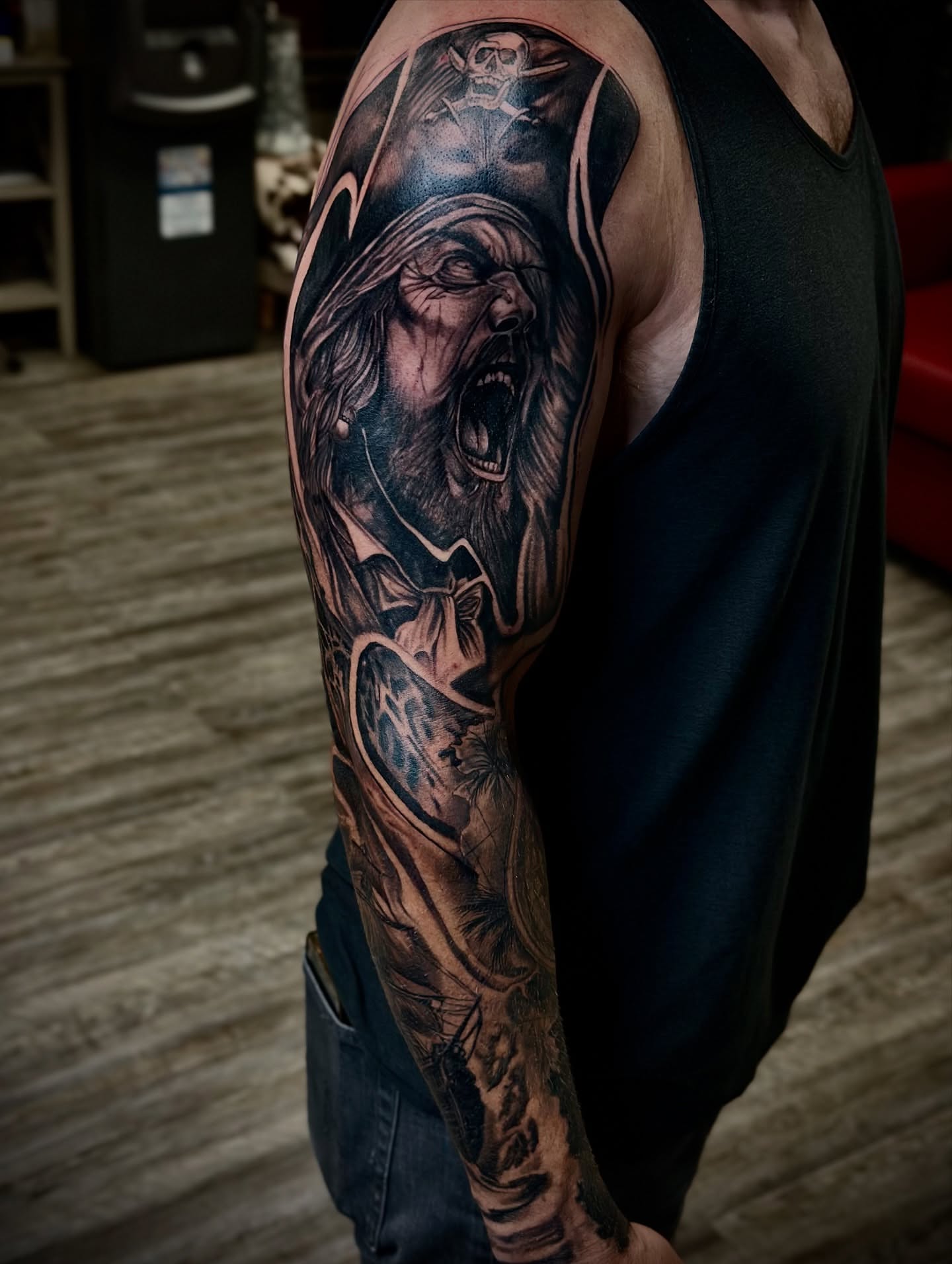 Scream dark realism tattoo on the upper arm by Tattoo Artist Ian Day (Everlasting_Art_Ink)