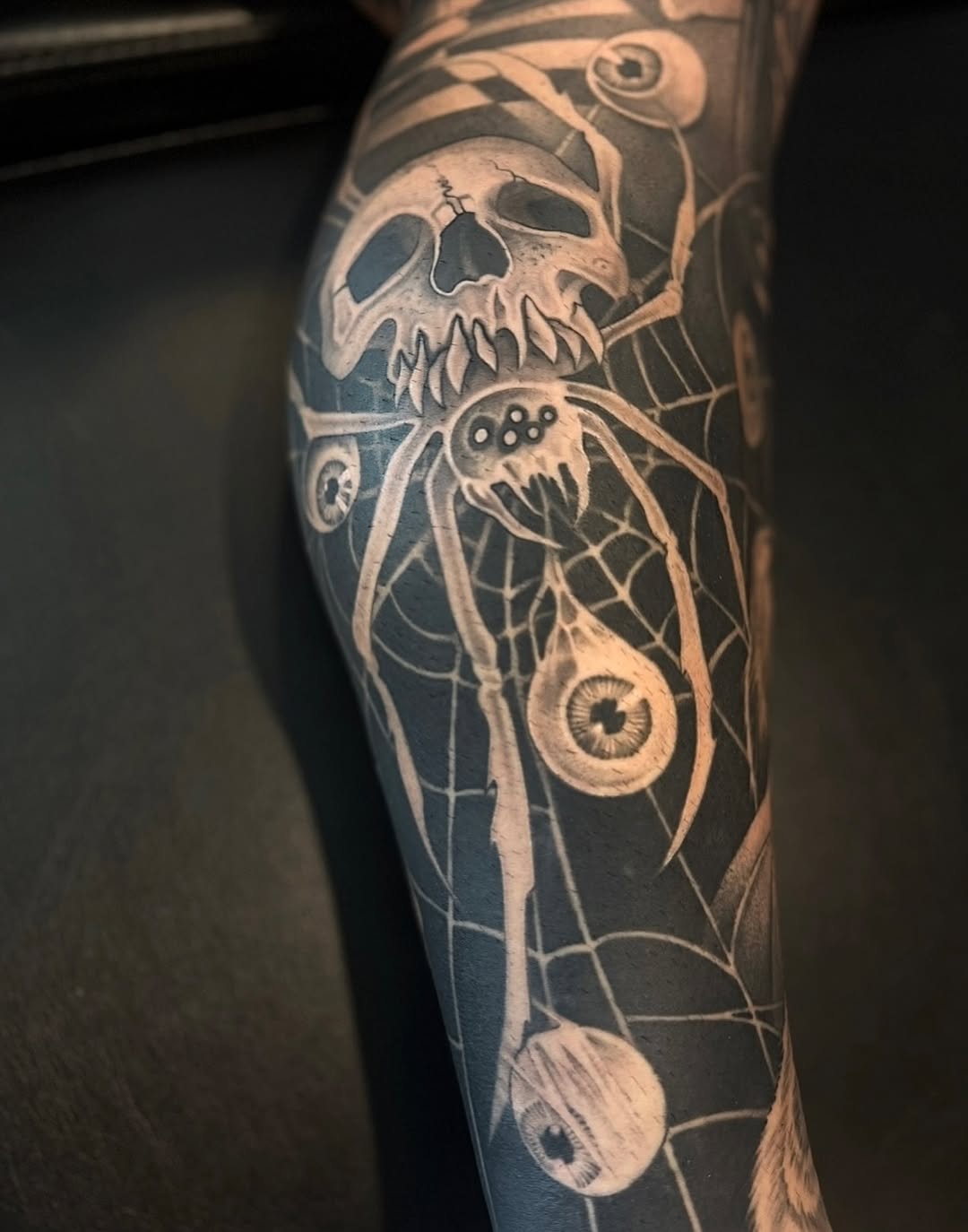 Tattoo by @elijahforstertattoos — black_and_grey, dark_realism