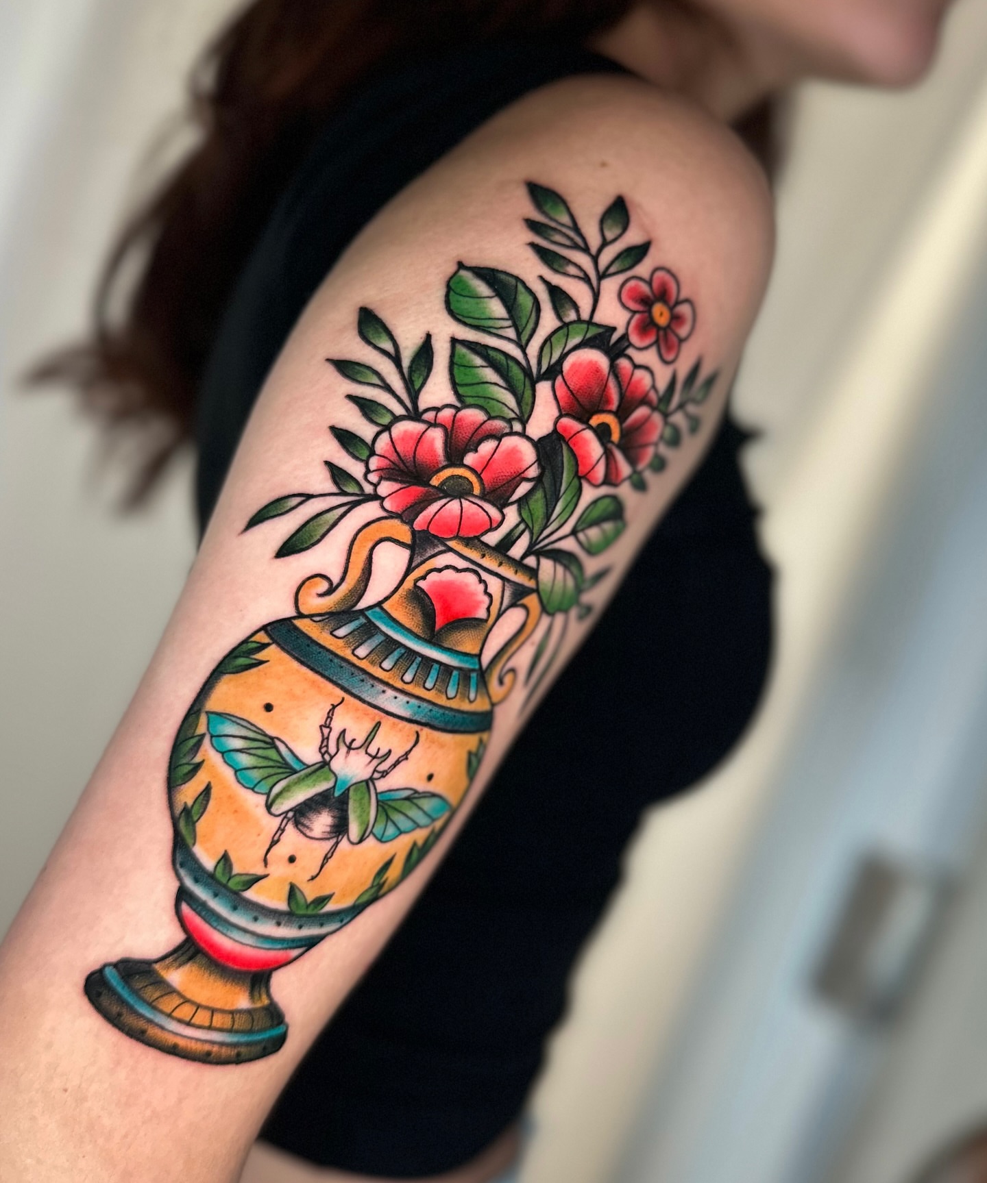 Jar with flowers American traditional tattoo on the forearm by zoe mars