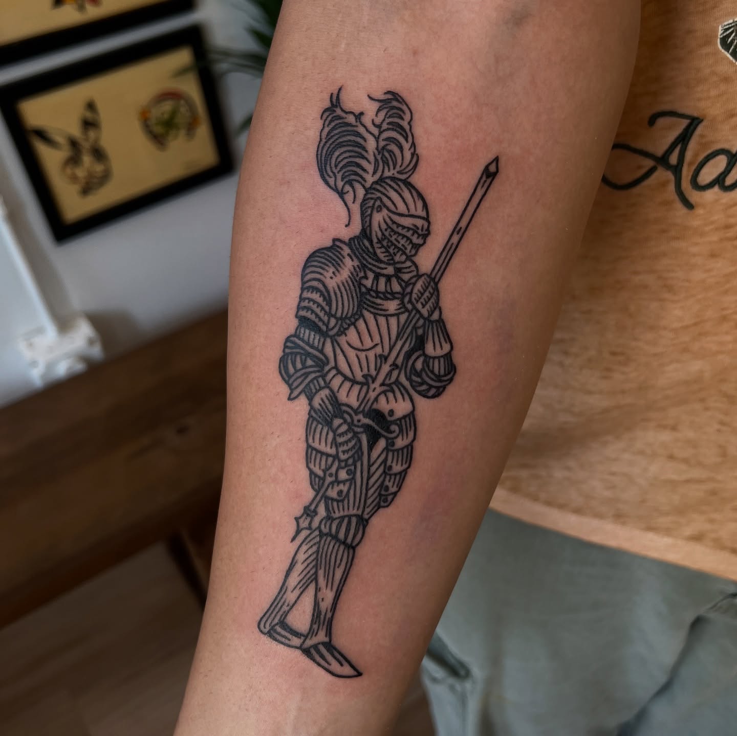 Knight in armor black and grey tattoo on the forearm by @syrenbier, San Francisco, California