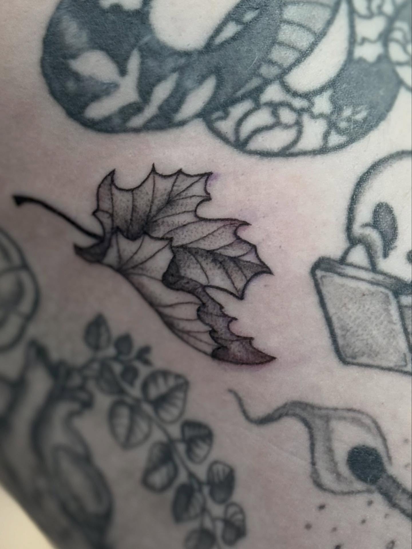Fall leaves dotwork tattoo on the forearm by Katie Stacy