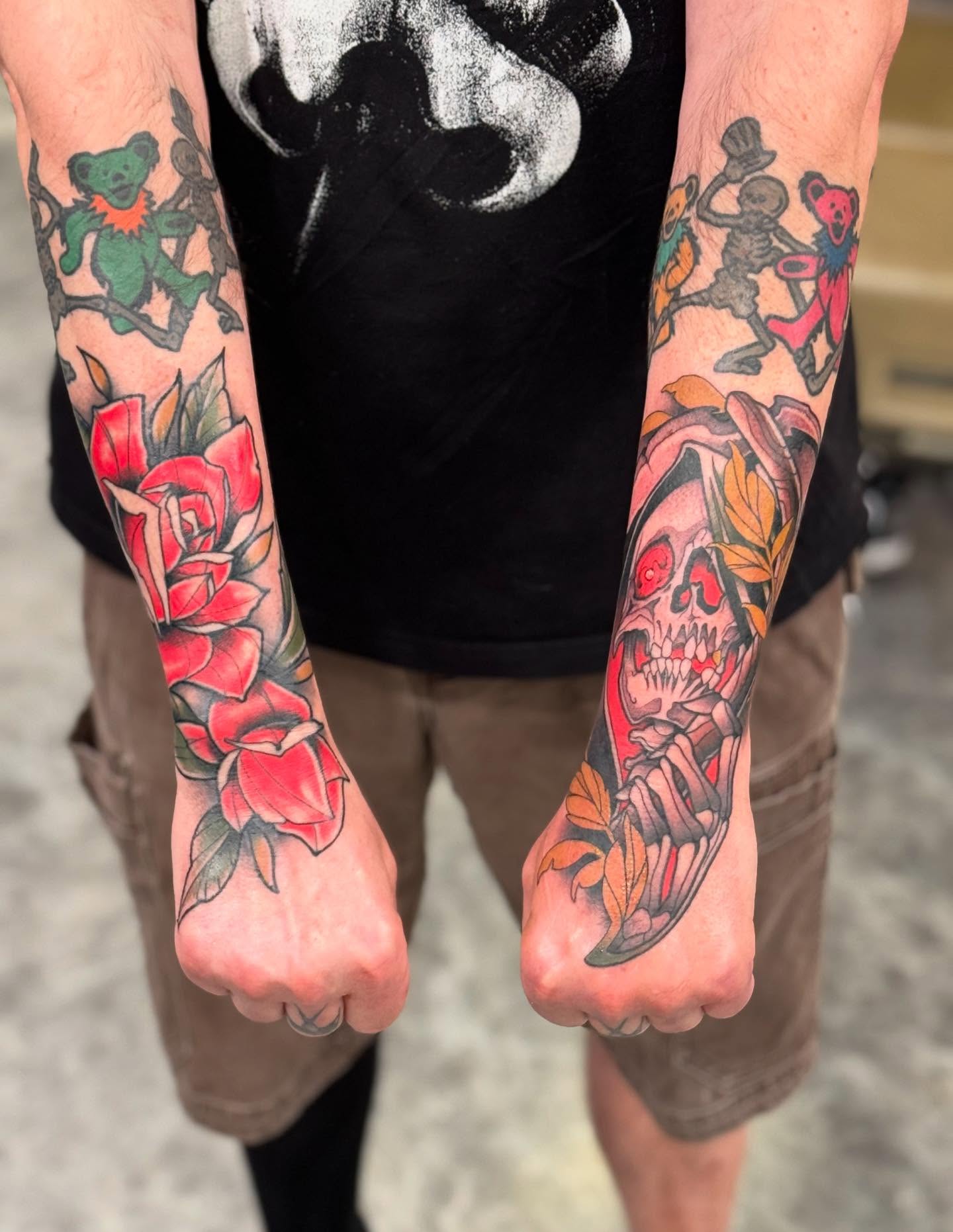 Roses and skull American traditional tattoo on the forearm by Jay Espinoza-AZ Tattooer