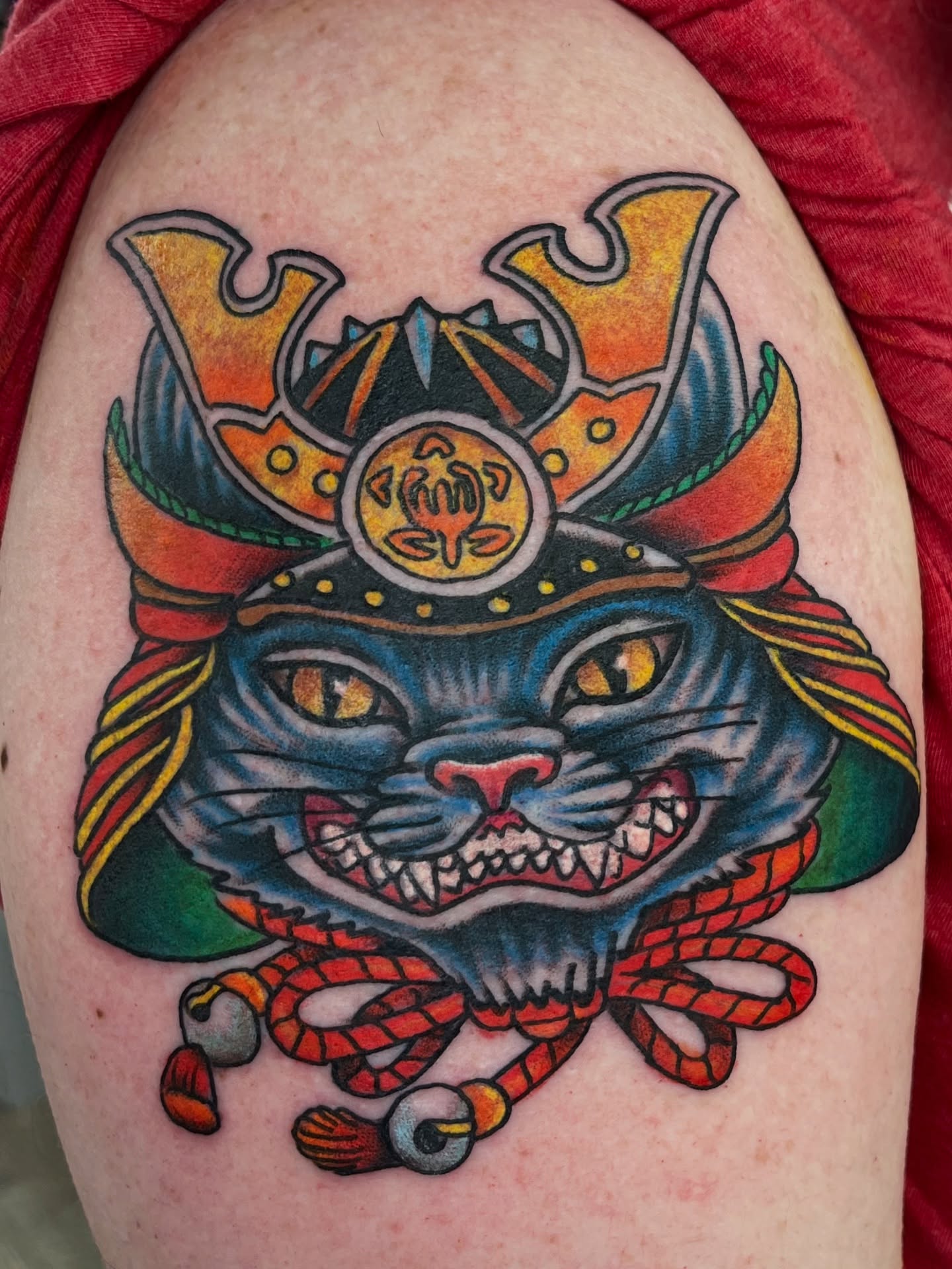 Cat American traditional tattoo on the shoulder by Steve Tiberi