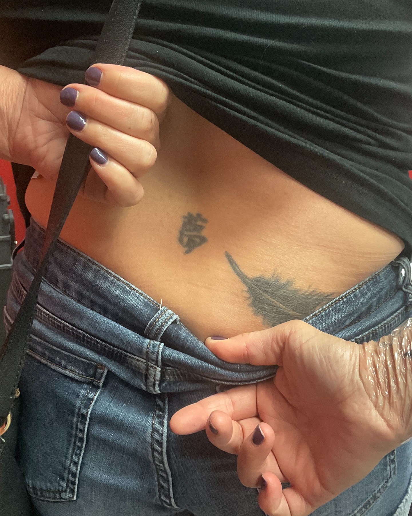 Kanji character black and grey tattoo on the torso by Ryland - Tattoo Artist