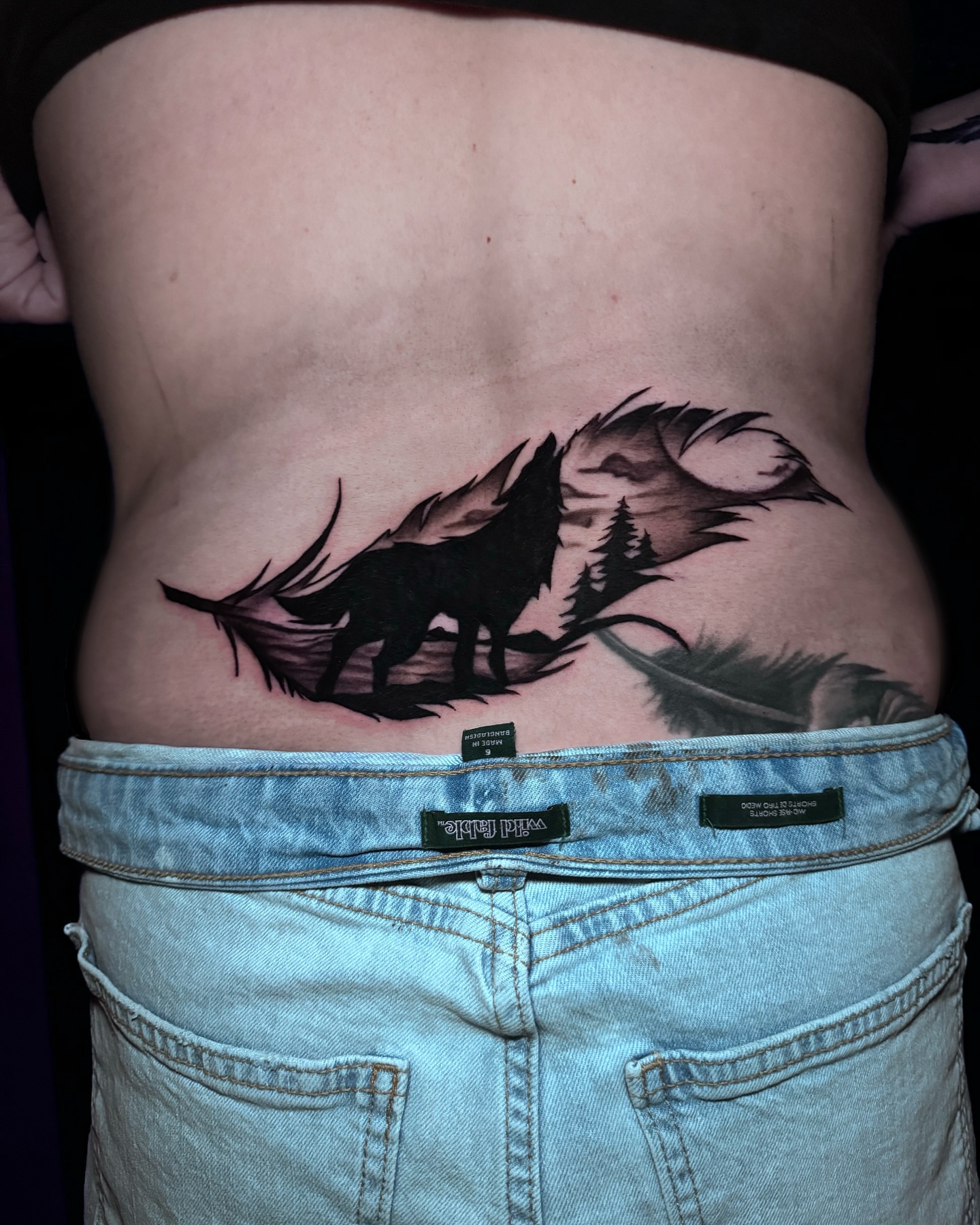 Wolf and forest realism tattoo on the ribs by Ryland - Tattoo Artist
