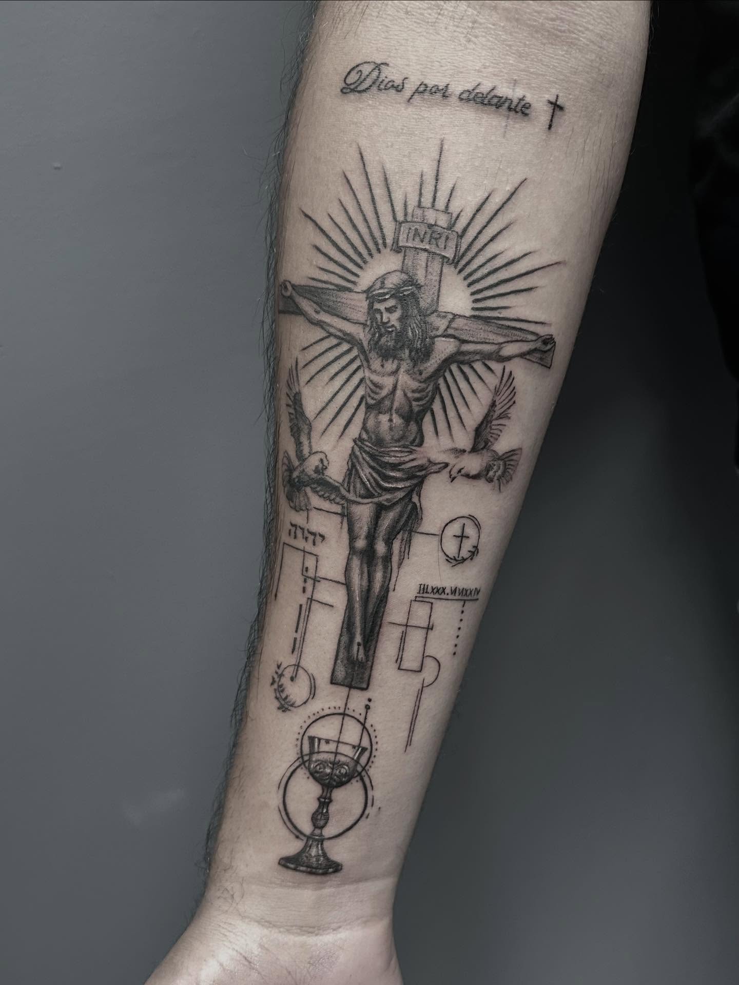 Religious crucifixion scene realism tattoo on the forearm by mia's tattoo, Los Angeles, California