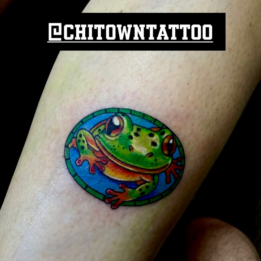 Frog new school tattoo on the forearm by Jameson William Cowan