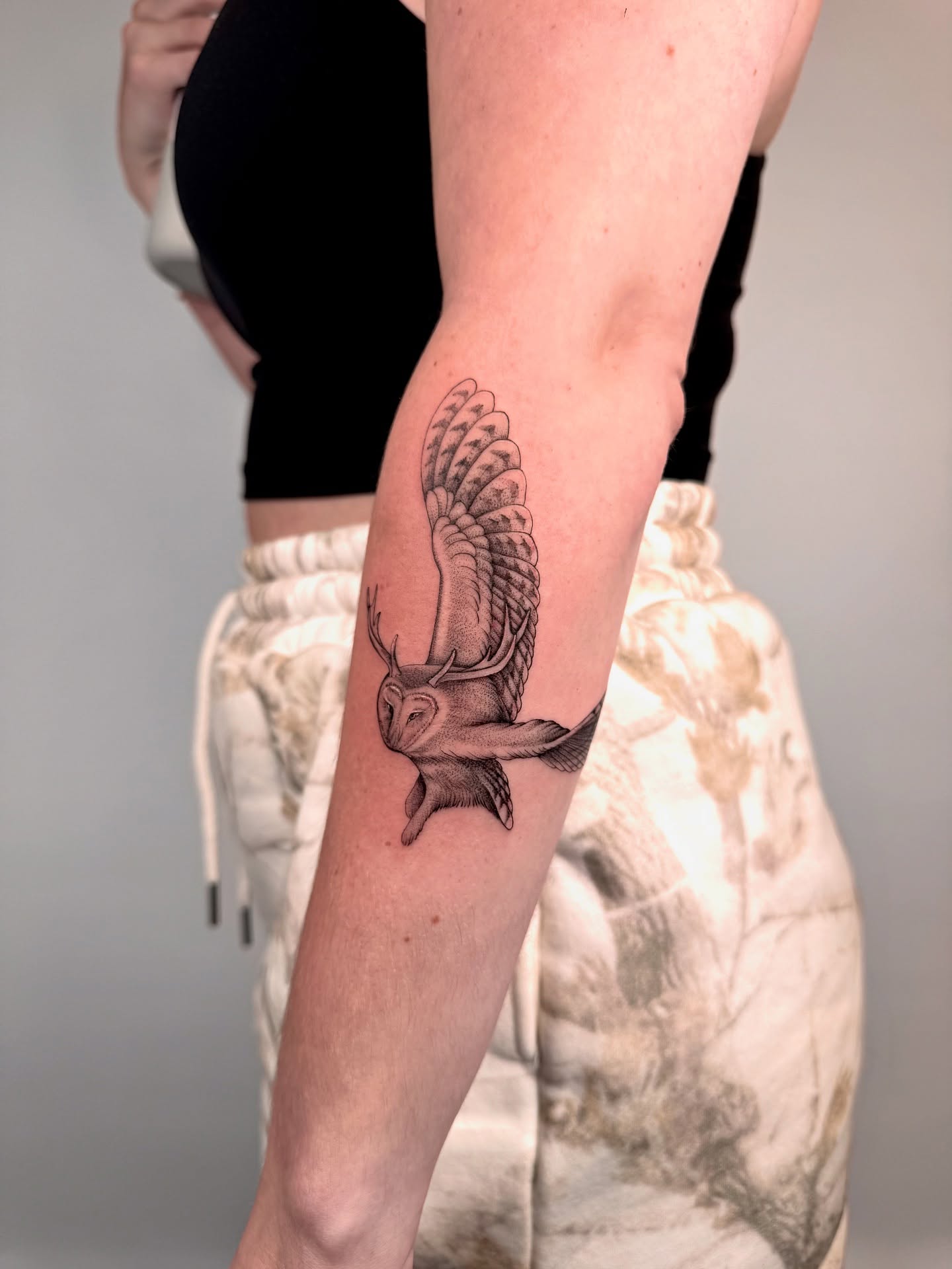 Owl black and grey tattoo on the forearm by MillaKas ° Tattoos