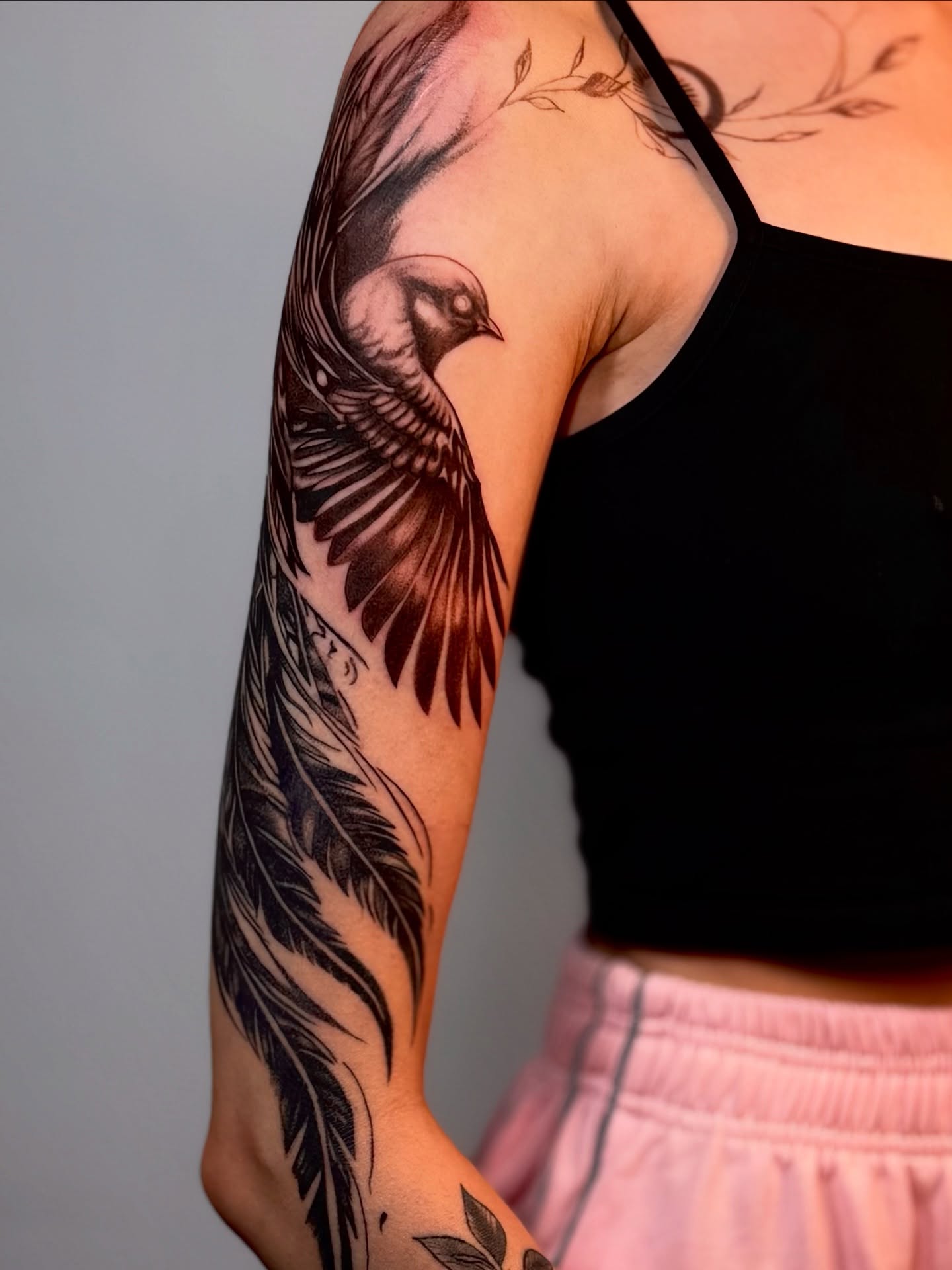 Bird black and grey tattoo on the forearm by Виктория Лукьянова