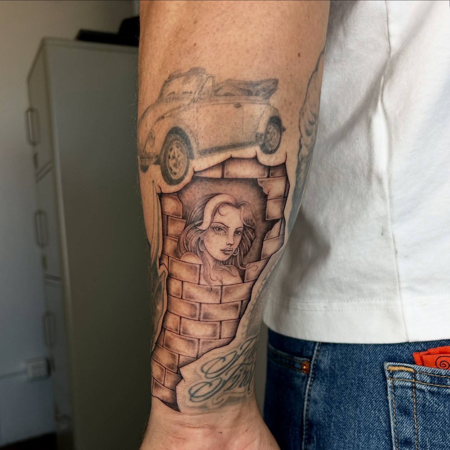 Woman in brick tunnel realism tattoo on the forearm by ✭ Elisa ✭