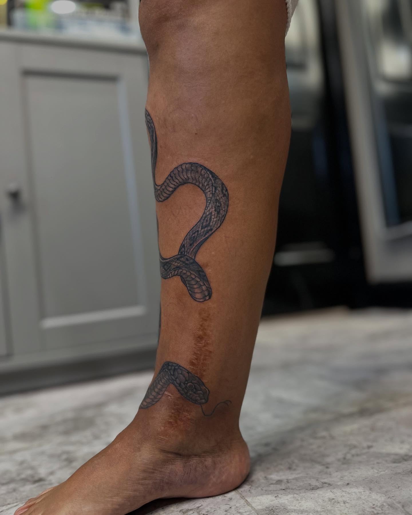 Tattoo by @inked_alex — black_and_grey