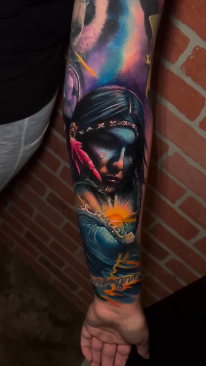 Native American woman and panda bear realism tattoo by Raul Ugarte, Roseville, California